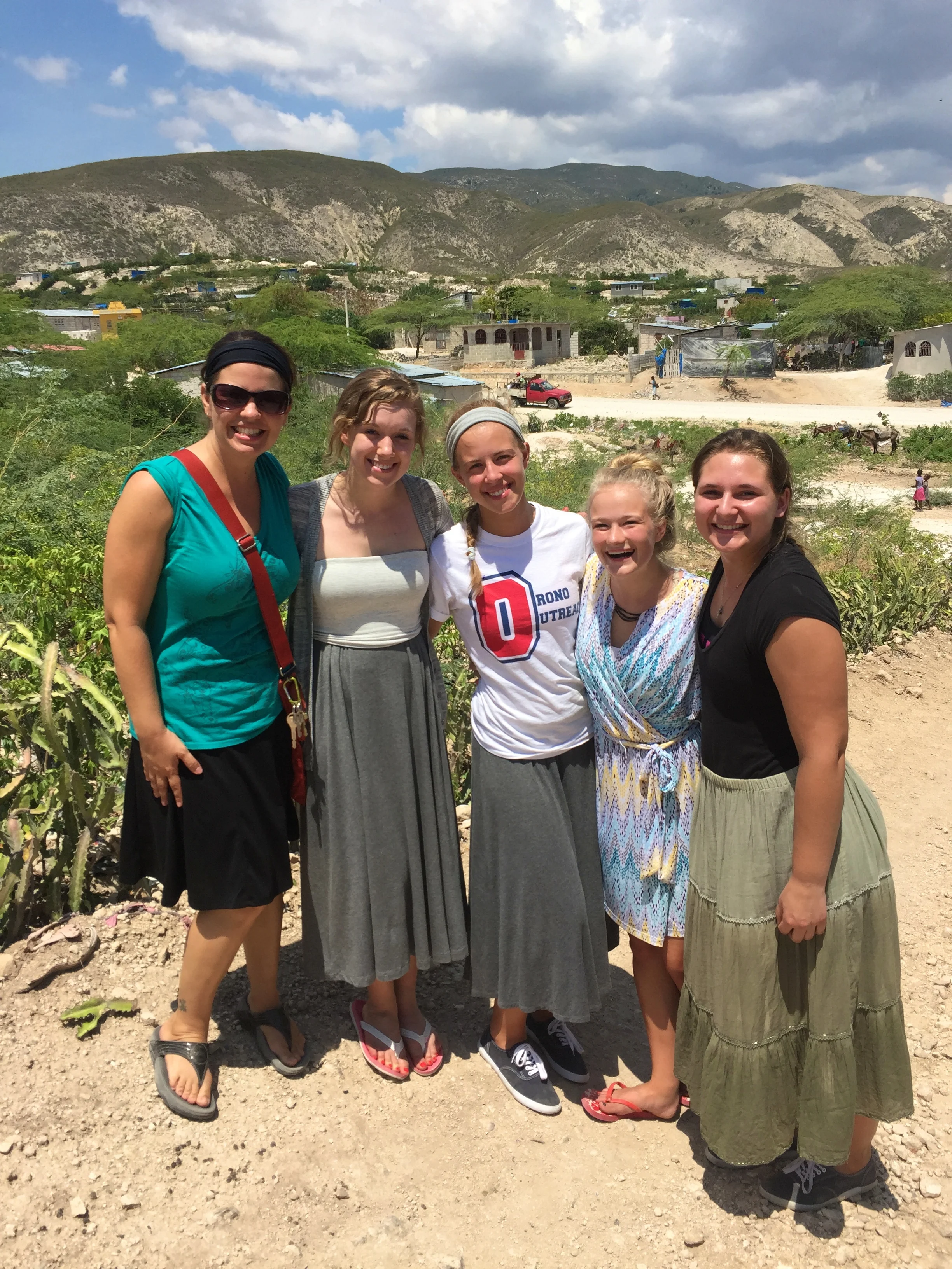 Some of the girls in Titanyen with our friend and fearless captain today Jennifer.