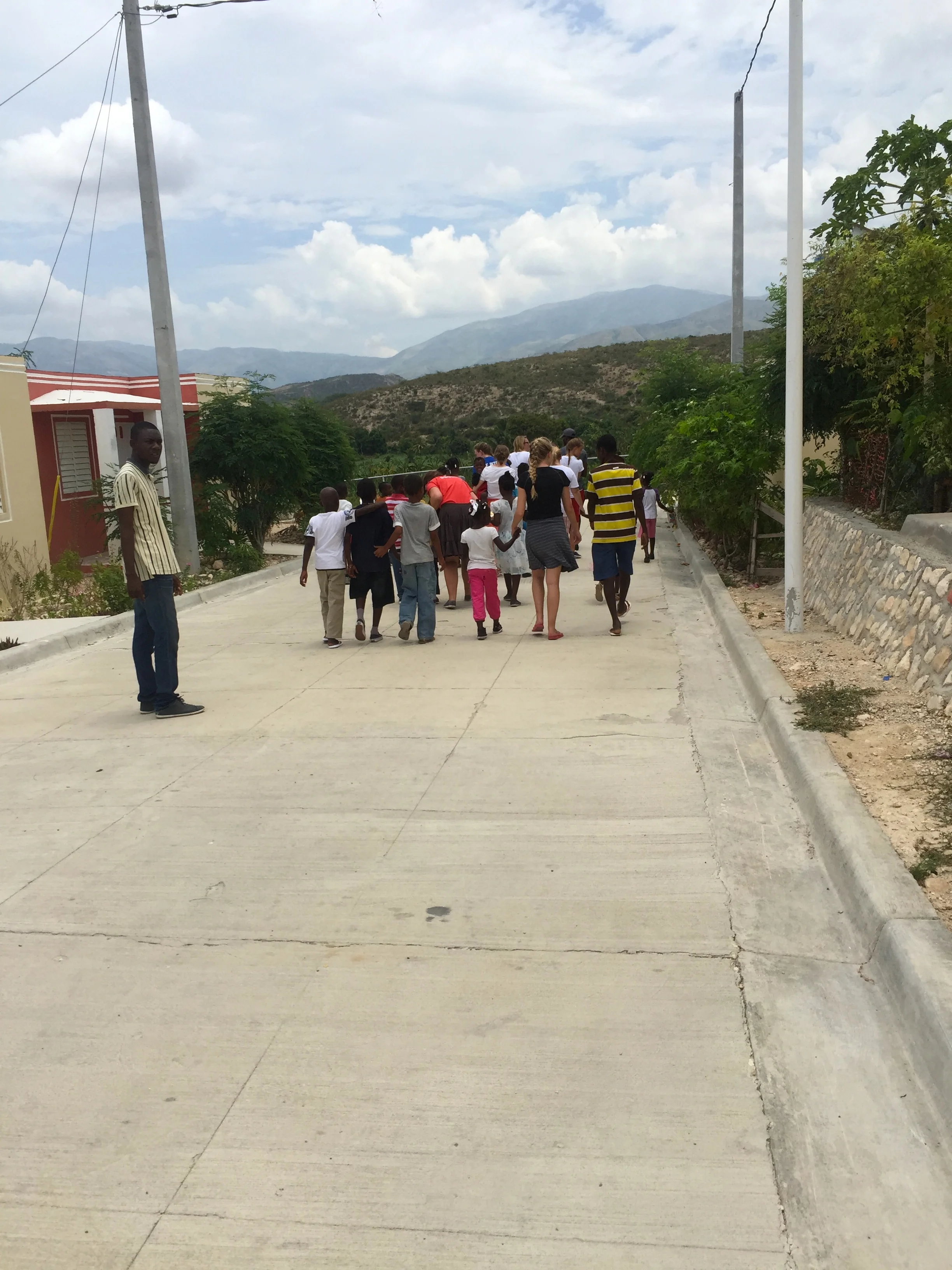 Checking out the community and their water supply.