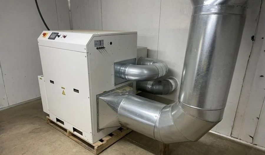 Ducted heat recovery equipment installed with a commercial dehumidification system to help manage temperature control.