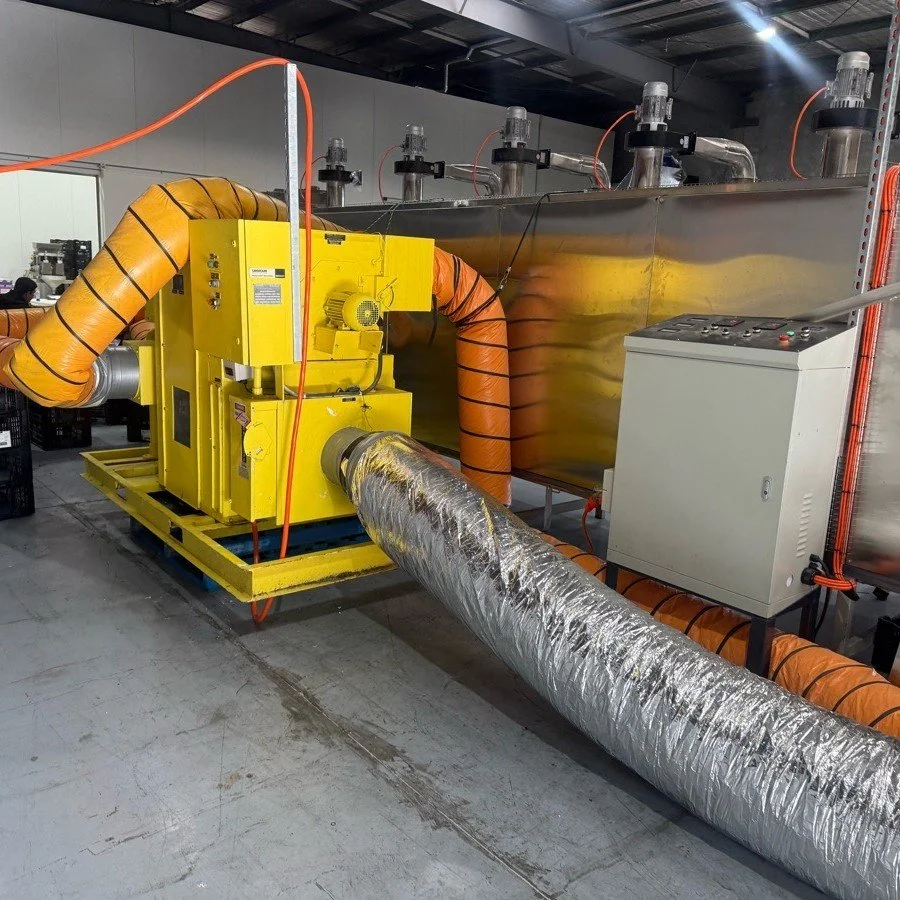 Rental desiccant dehumidifier connected to CPK pet food drying process