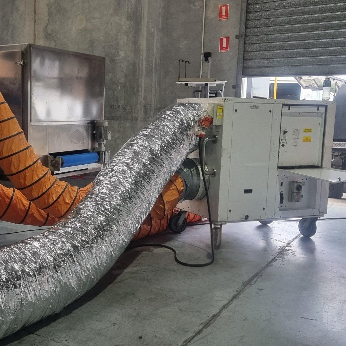 Rental packaged air conditioning unit connected to CPK pet food drying process