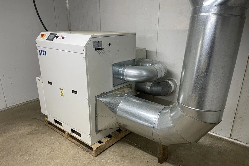Ducted heat recovery equipment installed with a commercial dehumidification system to help manage temperature control.