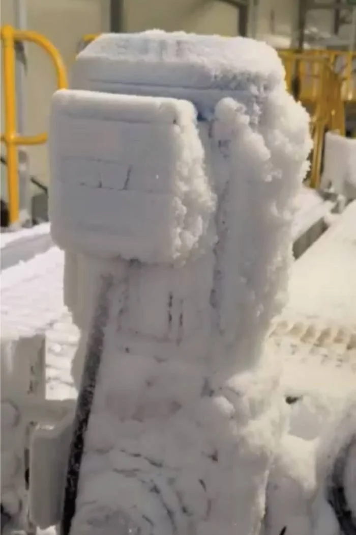 thick ice build up in a meat processing blast freezer