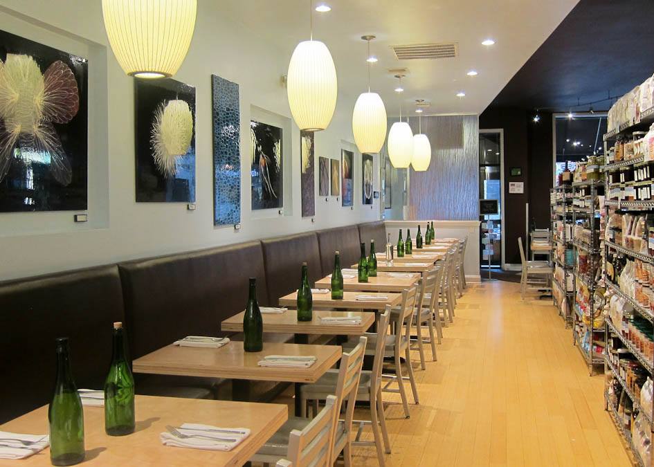A interior view of Southport Grocery & Cafe's dining and grocery options.