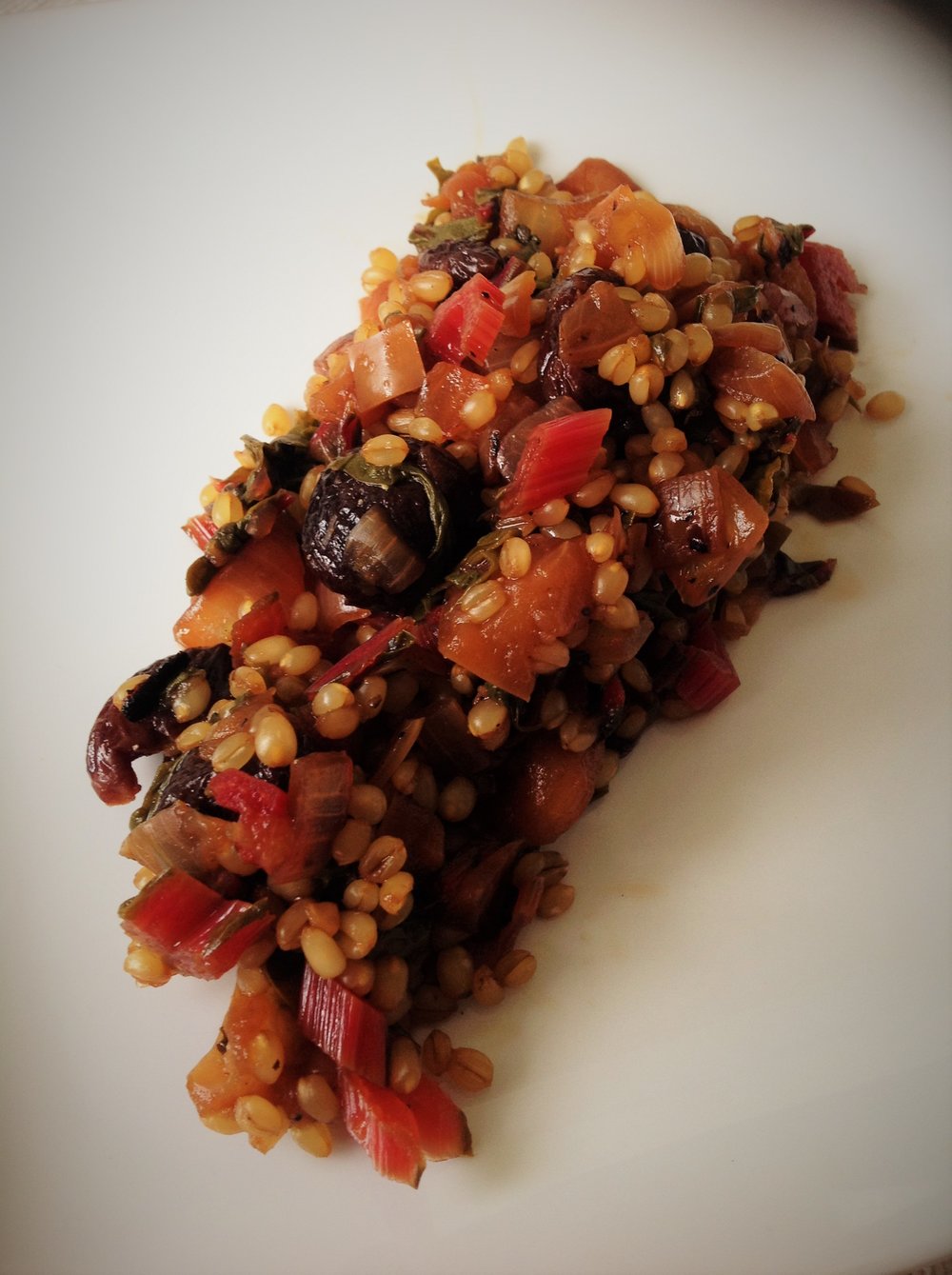 Wheat berry cherry and chard salad by Chef Katie Simmons - Healthy, Whole Grain, Oil-Free, Plant-Based Vegan, and utilizing the bounty of the freshest ingredients the beginning of the farmers market season has to offer. PHOTO COURTESY OF KATIE SIMMONS. SOURCE : PLANTSRULE.COM