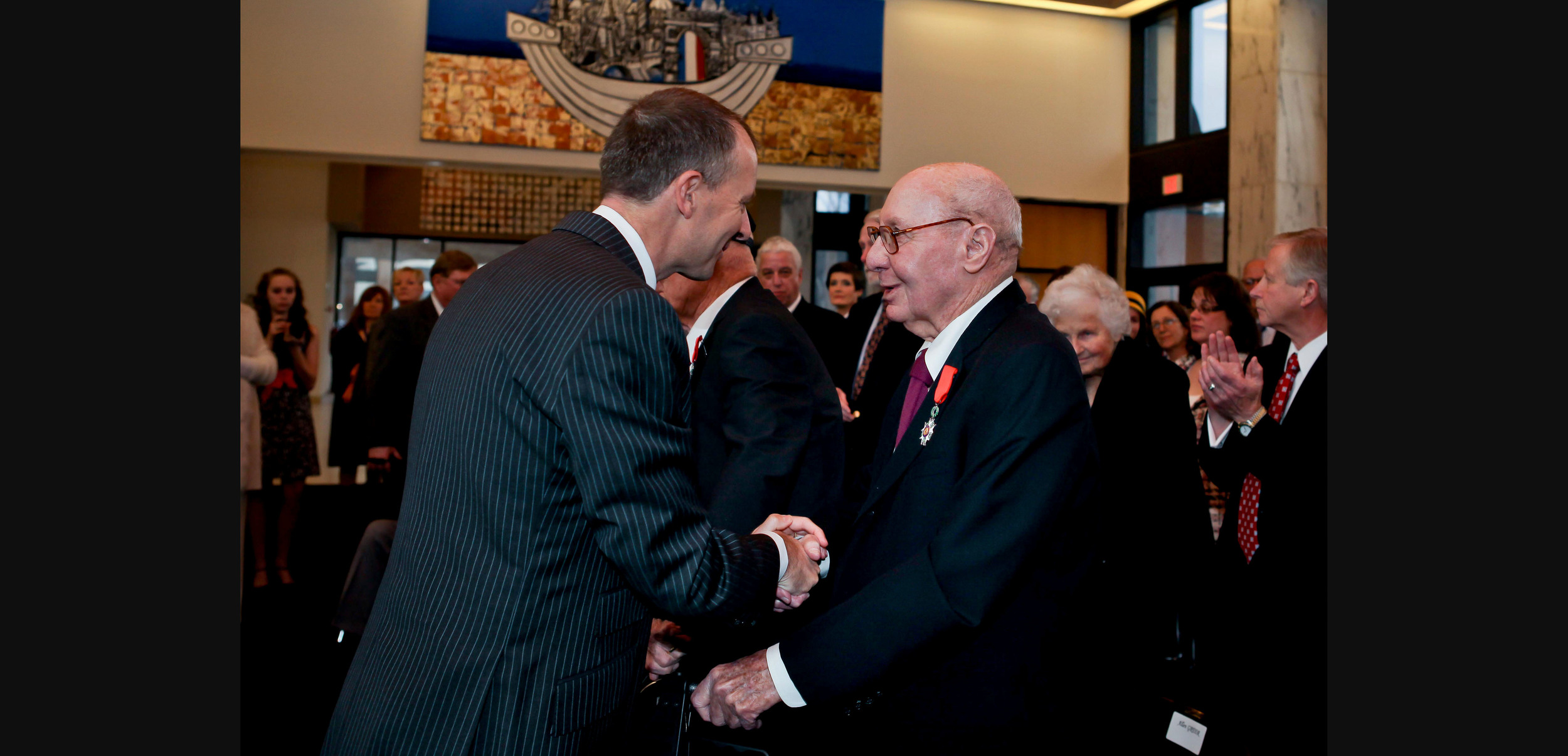 Washington Consul General Olivier Serot Alméras honors WWII veterans at the Embassy of France
