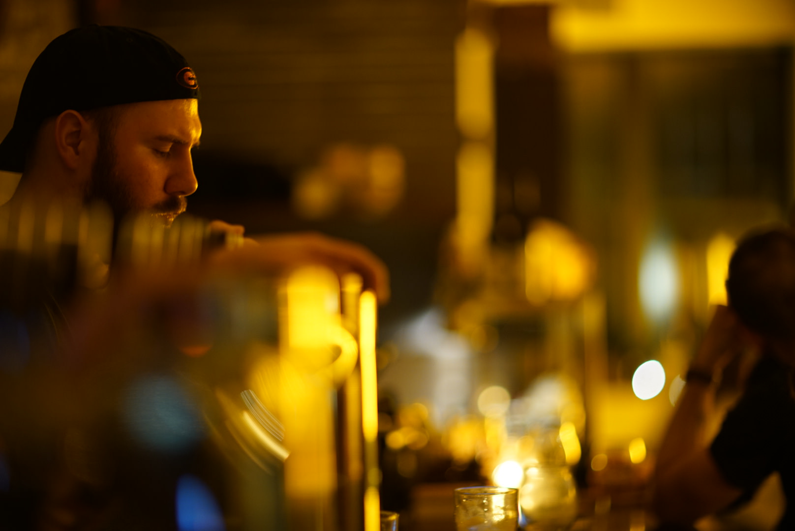 Bartender pouring beer