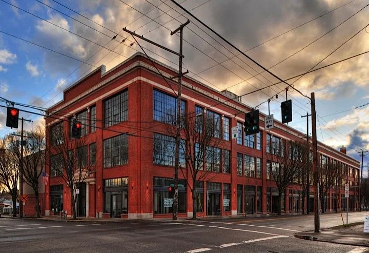 90+ Tenant community consisting of artists, makers, start-ups and growing small businesses. Featuring tall ceilings, great window lines, shared conference rooms, call rooms, interior bike storage, showers, secured access, available parking, art gallery and event space.
