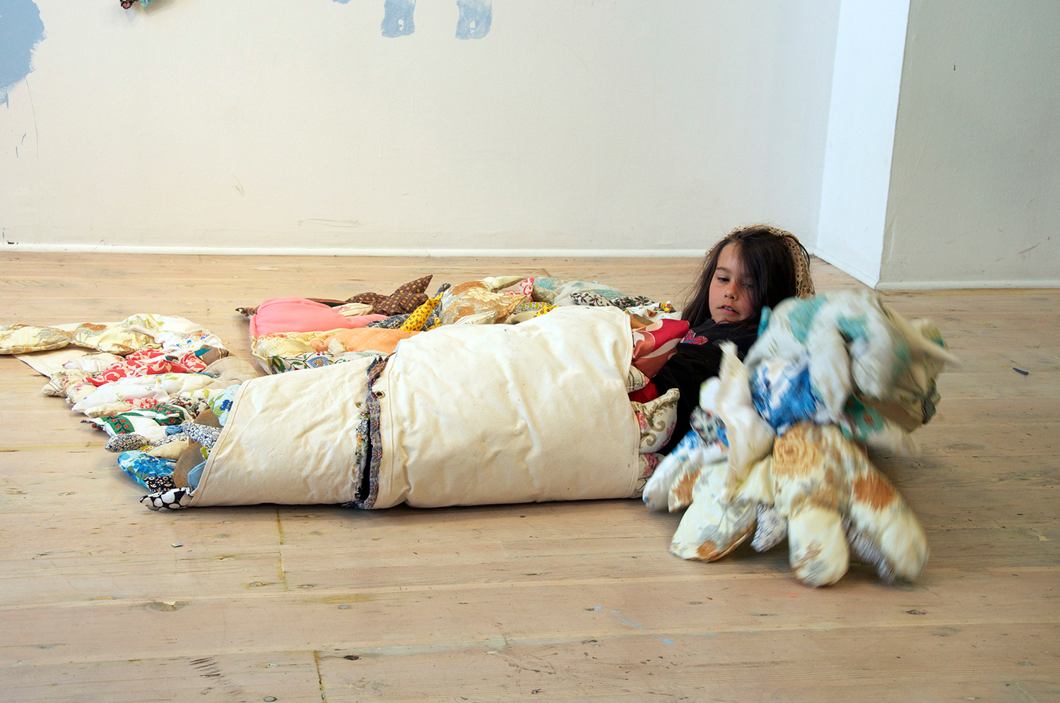 Mija never spoke. Just pointed and smiled at every piece of textile and clothing. She spent her three hours swimming in a sea of fabric. A type of performance that took her on a magic carpet ride.
