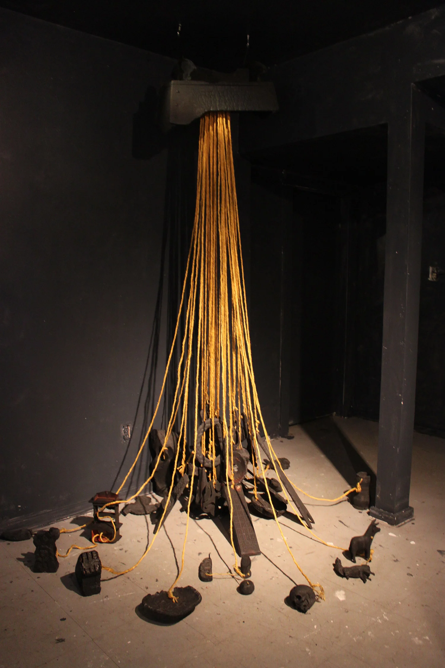 Cradle cord - burnt wooden cradle, hemp rope, burnt wood objects - Ministry of Casual Living, Victoria - 12 ft high x 6 ft base circumference - 2014