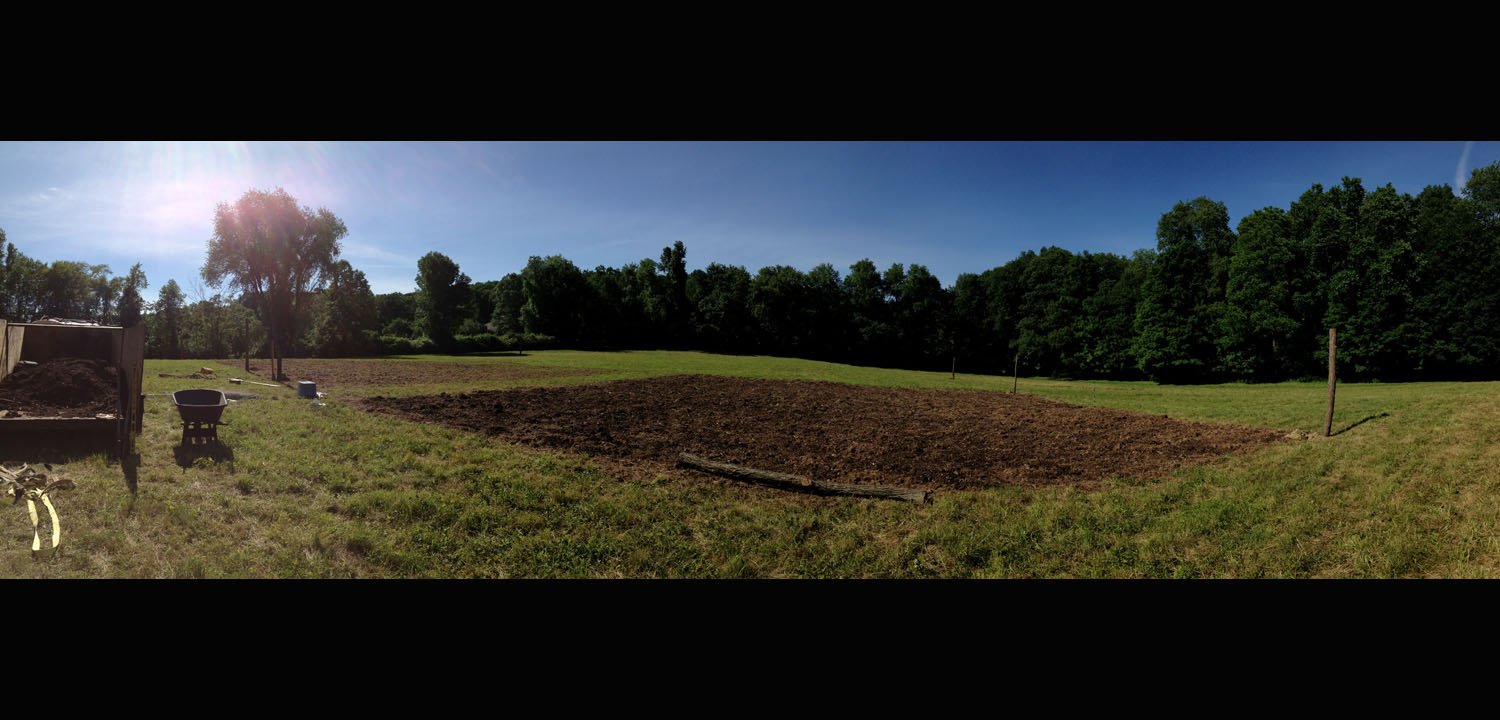 Half acre marked, ground has been broken and trees cut for posts.