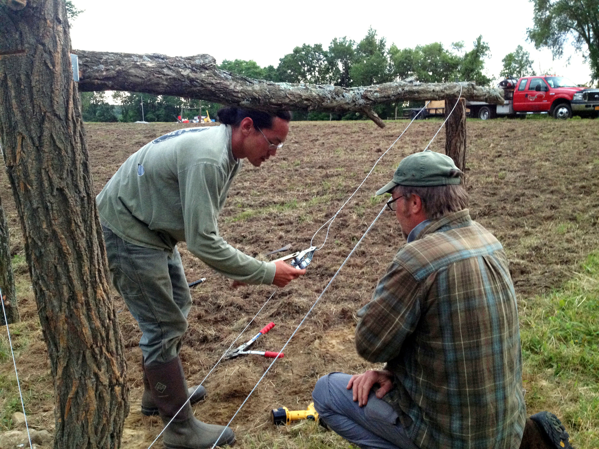 Wilson & Peter working on the fence.