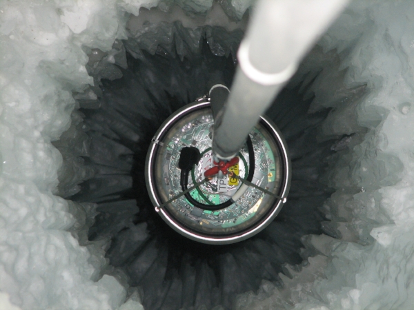 DOM (063A - Golden) being lowered into the ice.