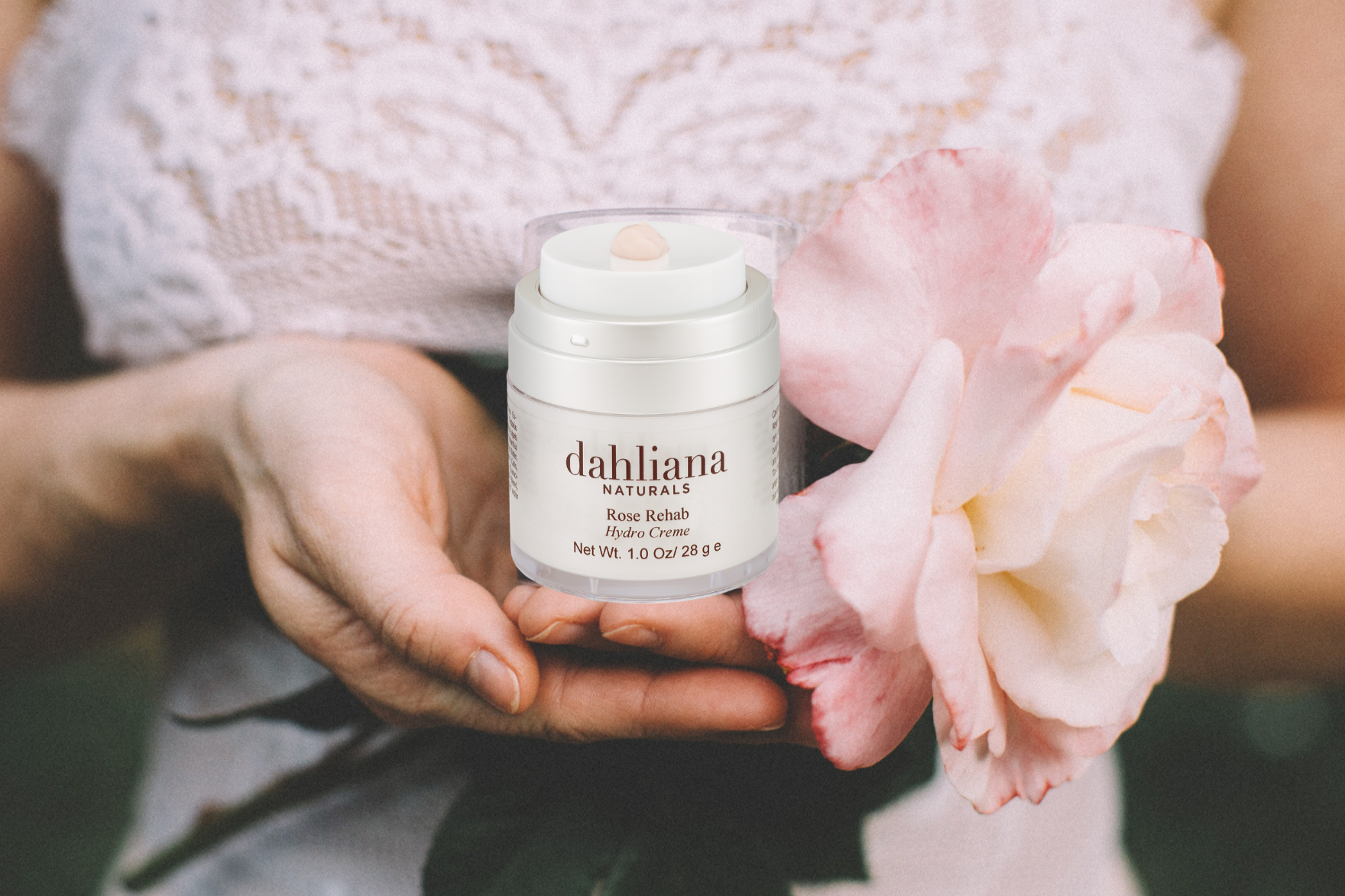 Dahliana+Rose+Cream+with+Hands+holding+the+cream+and+a+Rose+.png