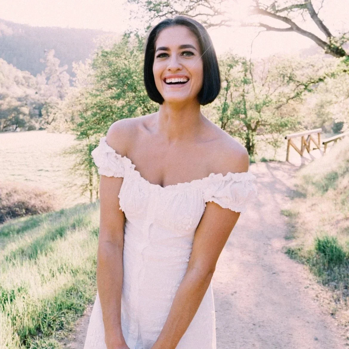 women in garden smiling