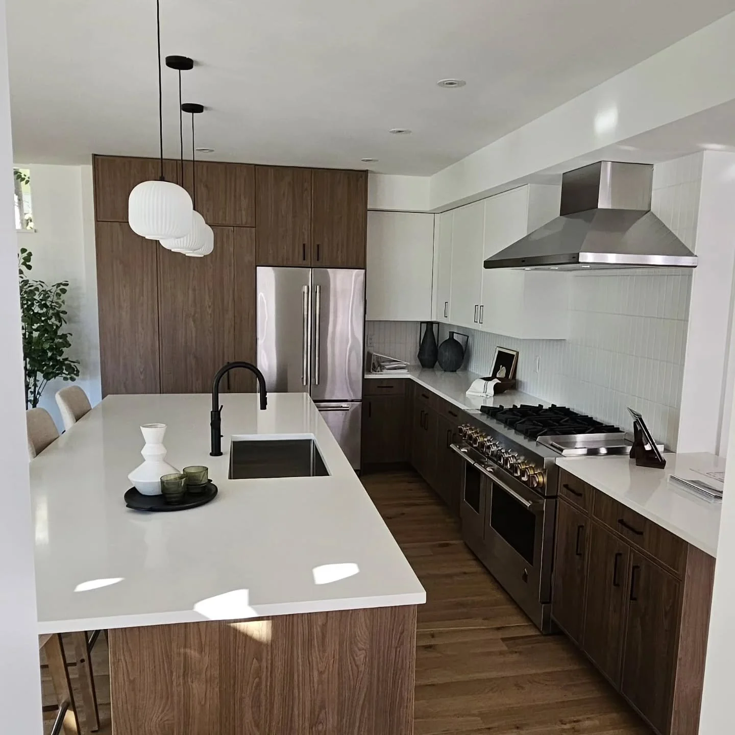Finished up the beautiful kitchen.  Premier Eurocase Natural Walnut and Ultra Matte White laminate  provide beautiful, durable surface. Done in a combination of Thin Shaker and Flat panel doors and drawers. And they are a Denver Company also!