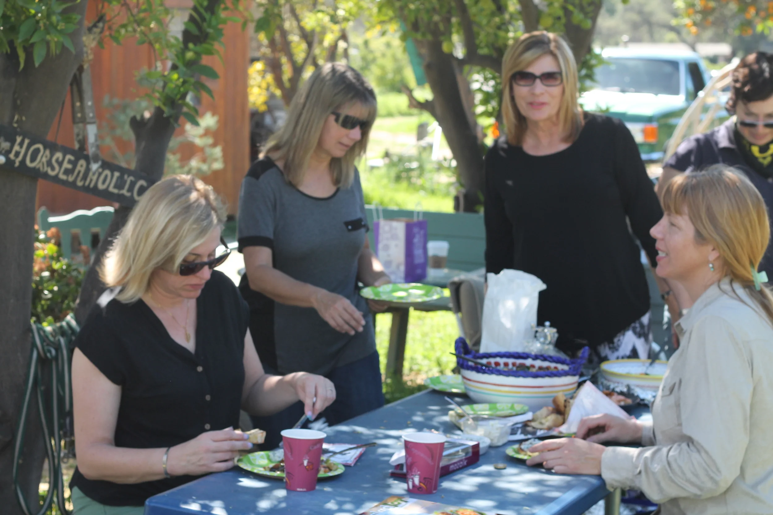 Julia serving her famous "Killer Griller" at a recent CCHR board meeting