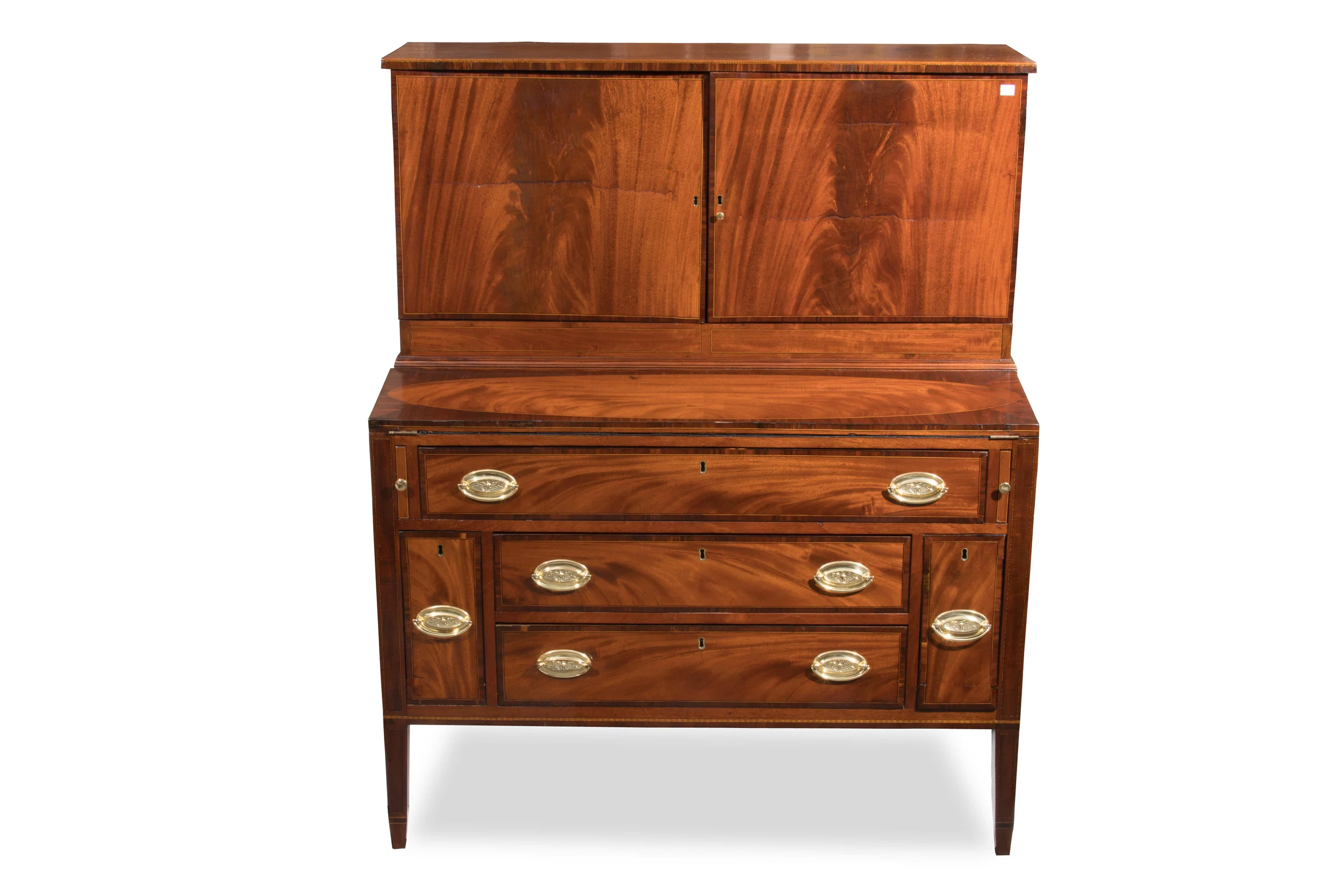 Unusual American Federal desk/cabinet with fitted interior on top and 5 drawers in lower case, including a pair of bottle drawers. Most likely NY origin circa 1810 