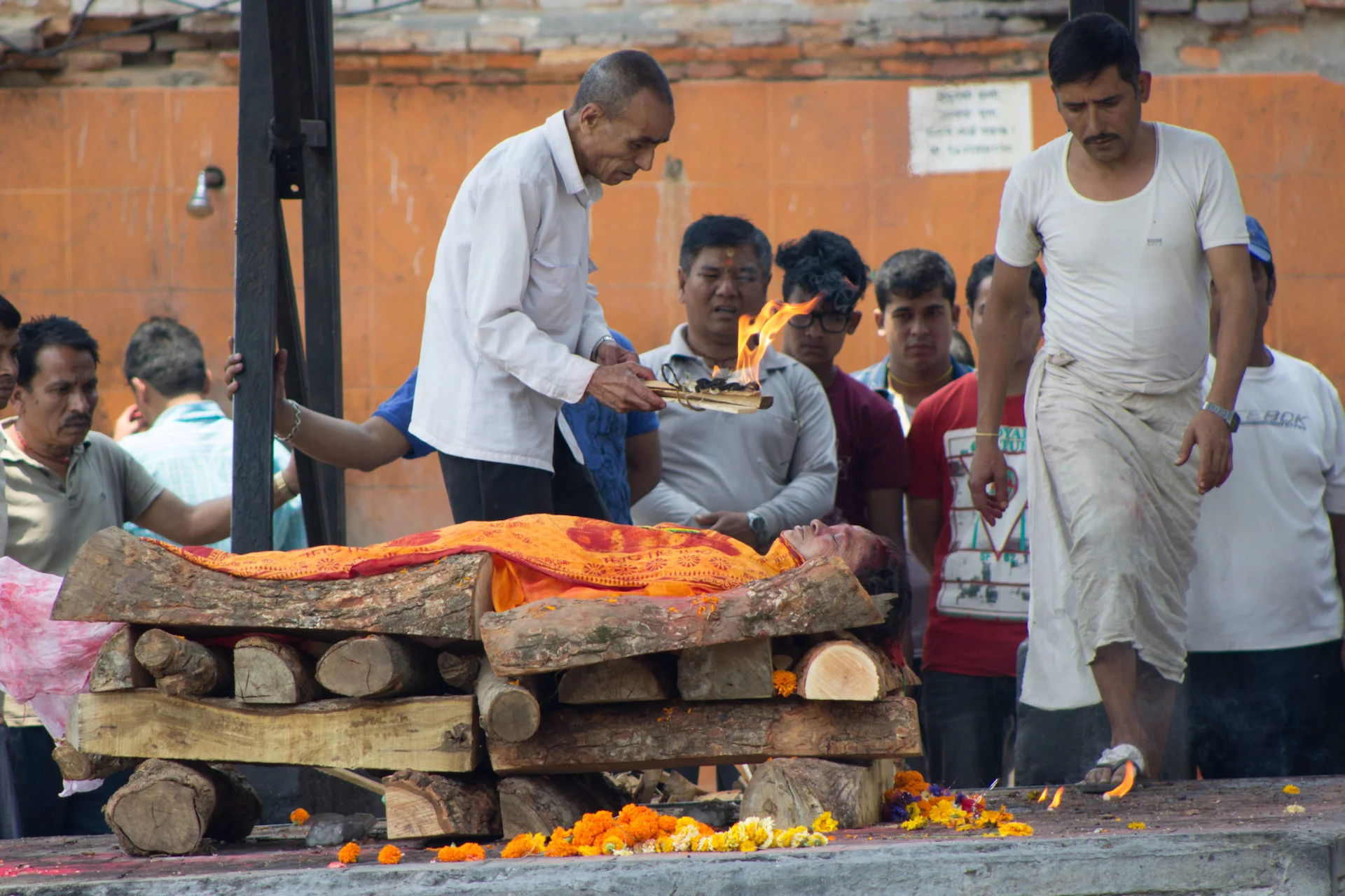 A man prepares to light a cremation pyre on fire at Pashupatinath Temple in Kathmandu, Nepal. Photo from the IMB Photo Library.