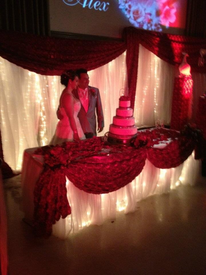 Newlyweds with wedding cake