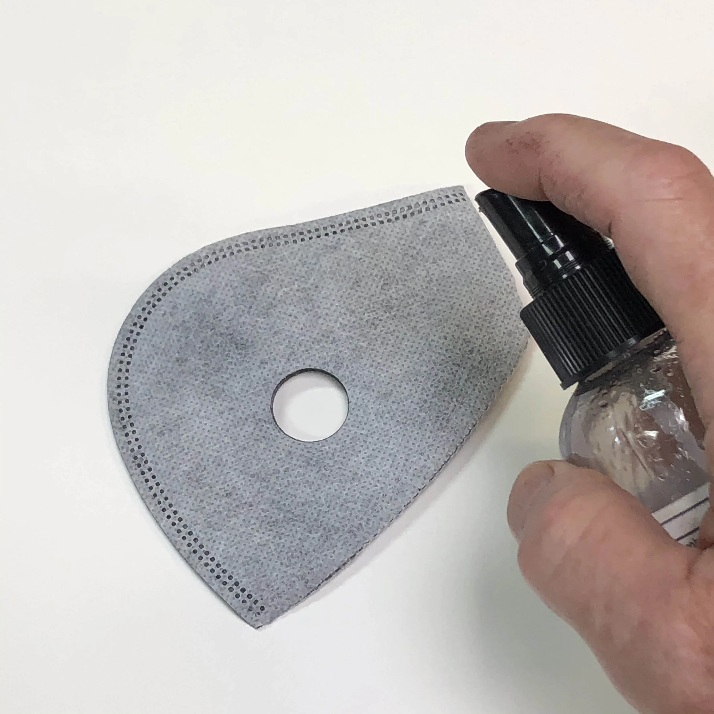 Spray the filter element with Isopropyl Alcohol, BOTH INSIDE AND OUT.