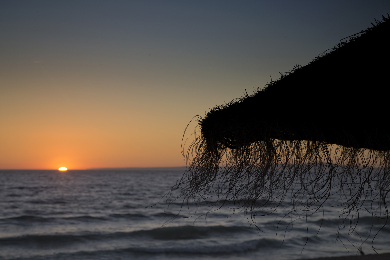 “ARCHITECTURAL MARVEL AMIDST UNSPOILED SURROUNDINGS AT A SPECTACULAR BEACH”