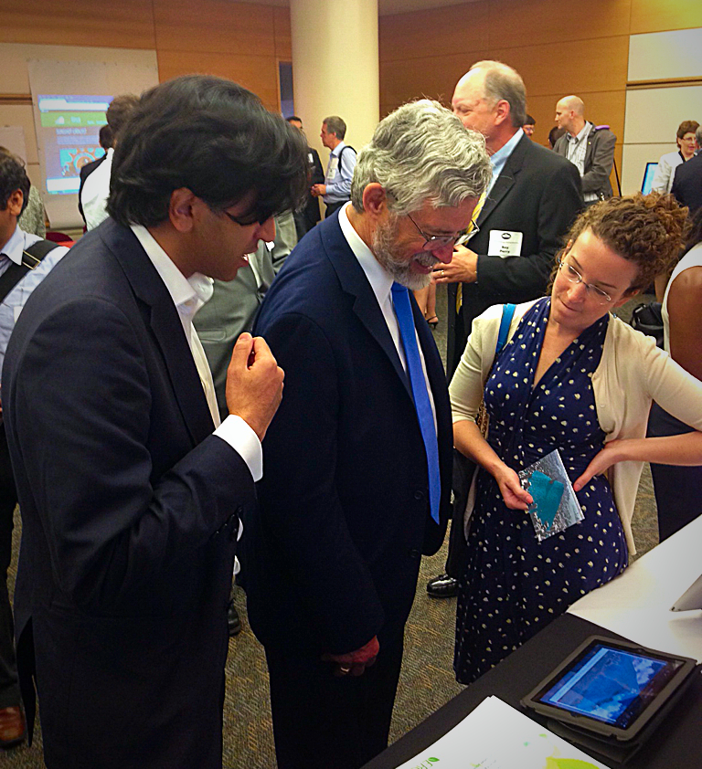  Carbon Visuals, Chief Operating Officer, Ravi Kapur in Washington at the Energy Datapoloza, May 28, 2014. Ravi is pictured with Dr. John Holdren, Director of the White House Office of Science and Technology Policy, watching our New York emissions vi