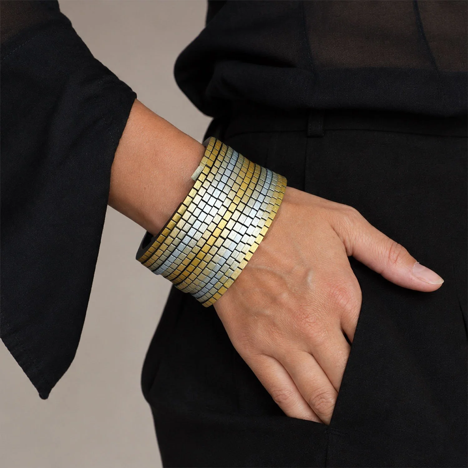 Wound-up-leather-statement-bracelet-gold-silver-Tania-Clarke-Hall-modelled-detail.jpg