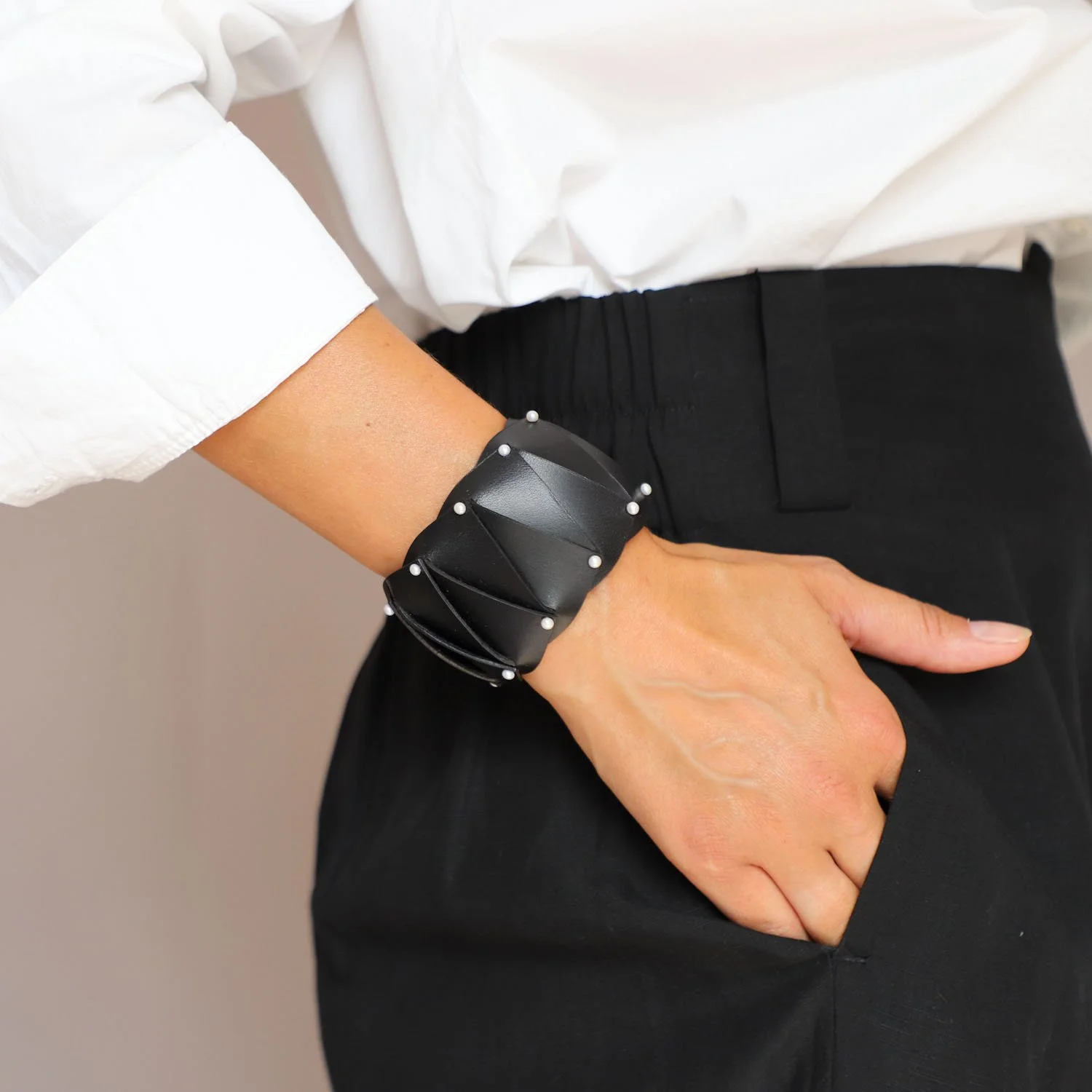 Cunard_pearl_leather_cuff_black_Tania_Clarke_Hall_modelled2.jpg
