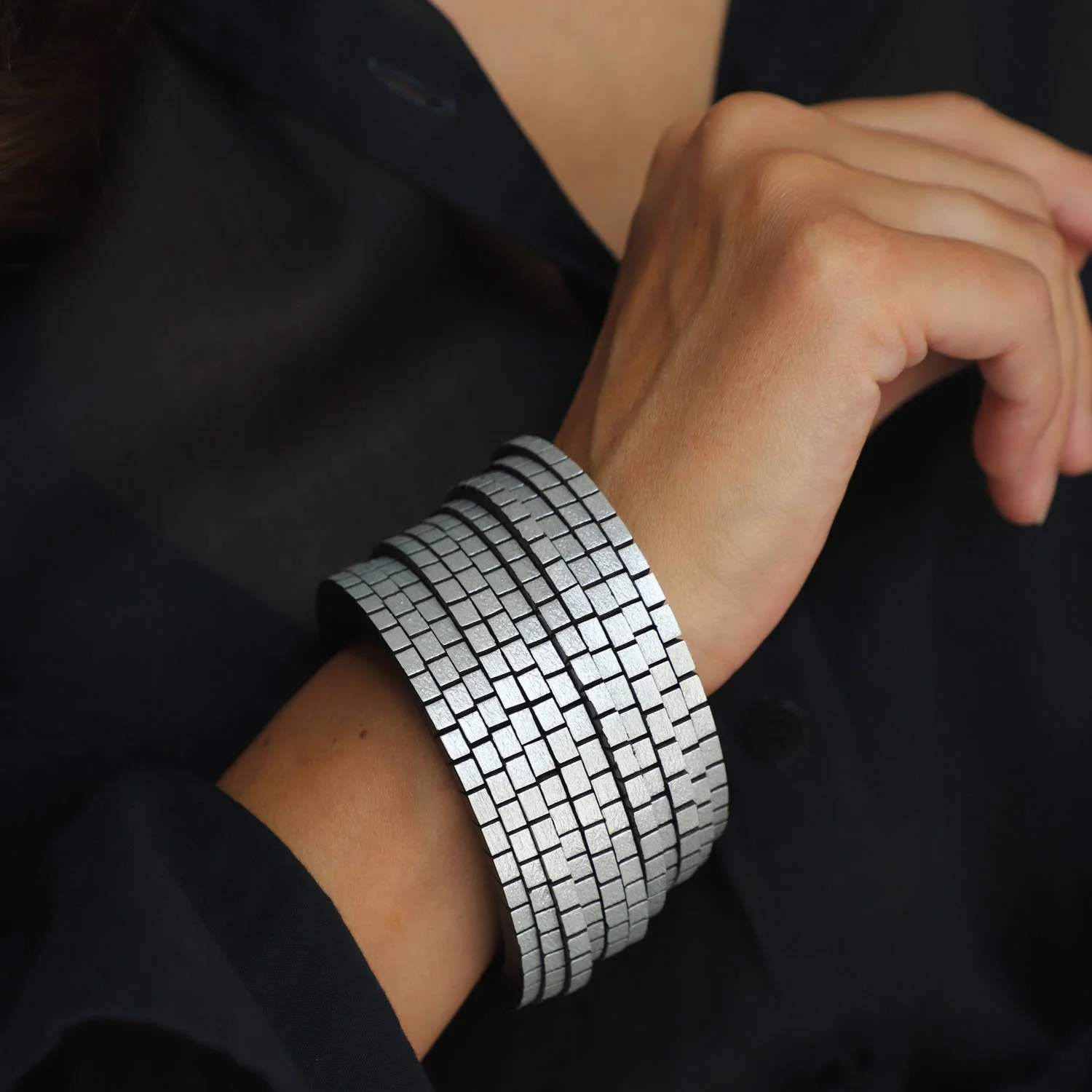 Wound-up-leather-statement-bracelet-silver-Tania-Clarke-Hall-modelled-detail.jpg
