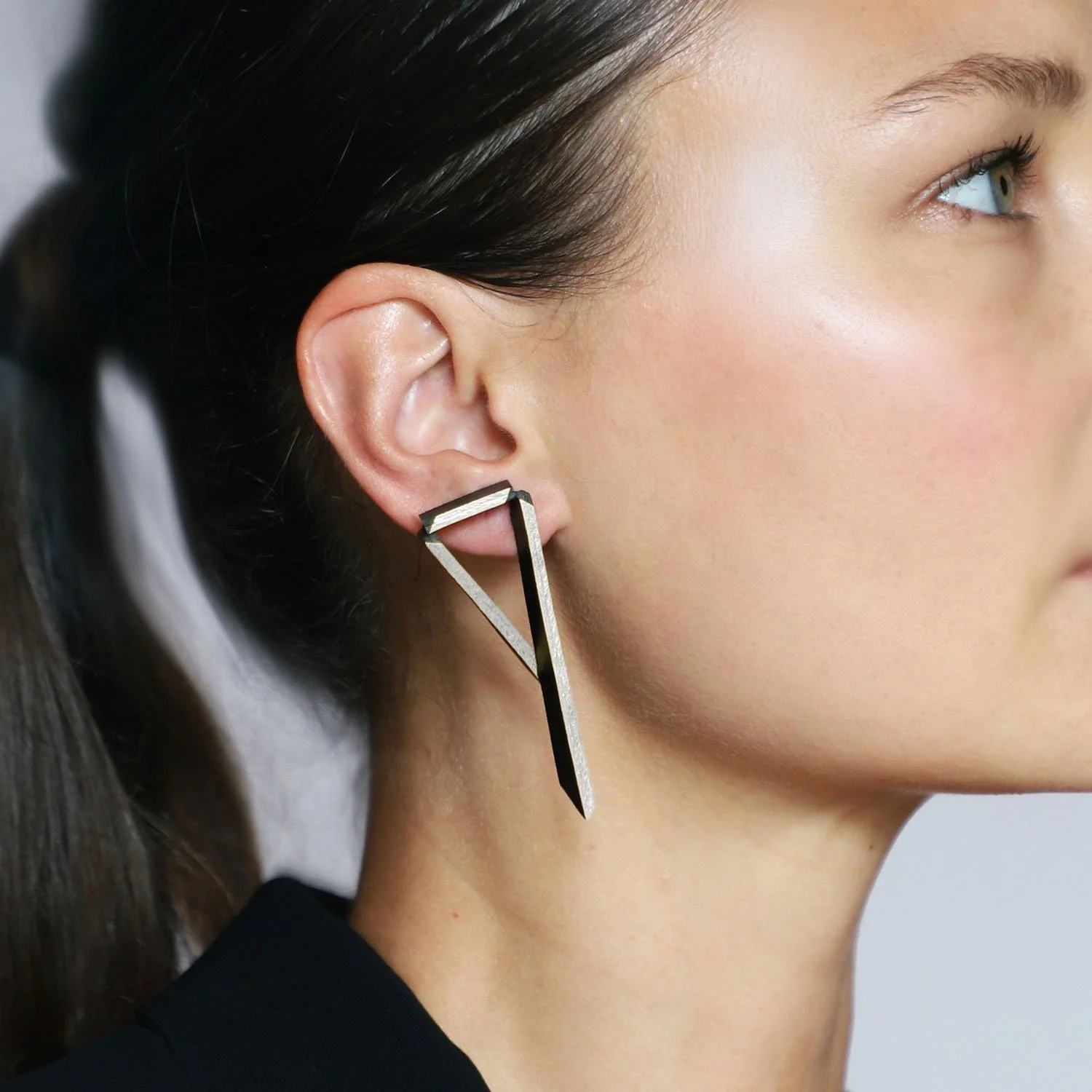 Triangulation-leather-earring-black-silver-Tania-Clarke-Hall-modelled.jpg