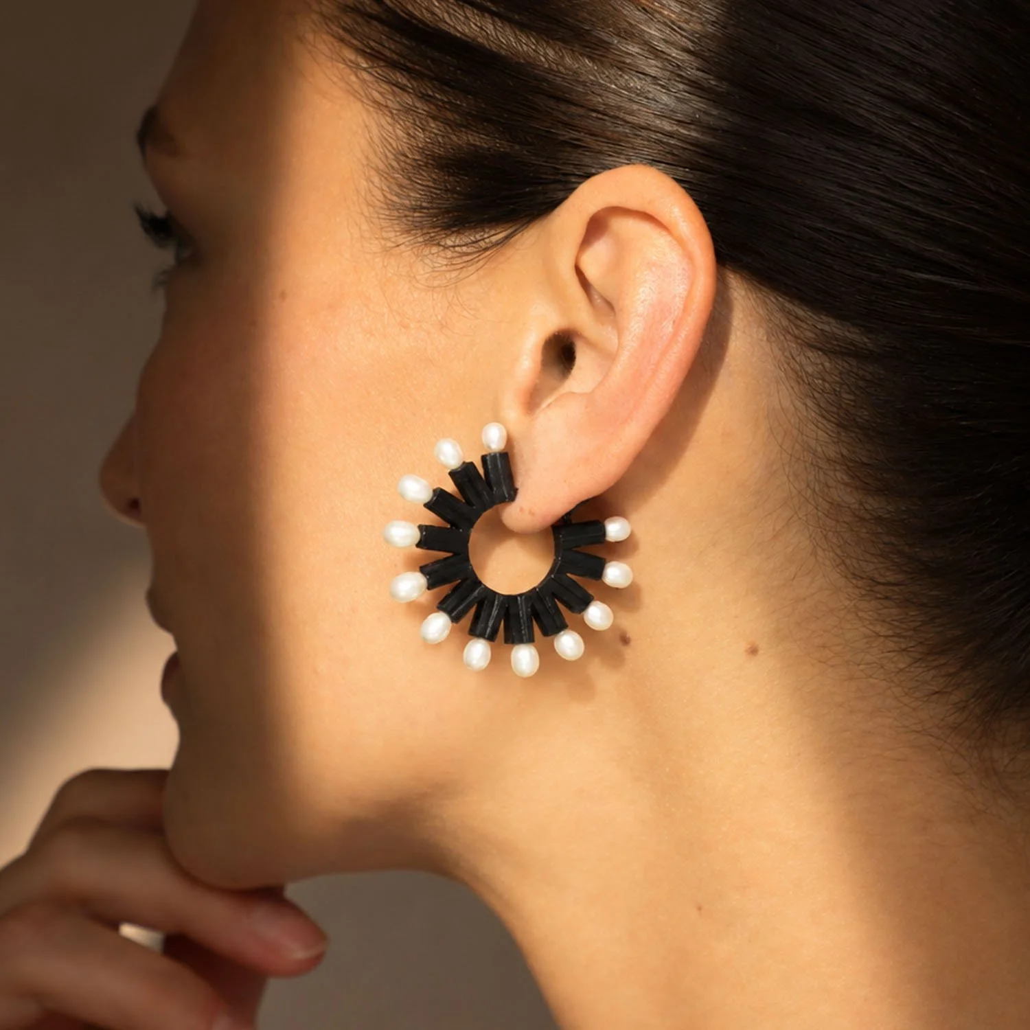 Pearl-loop-leather-statement-earring-black-Tania-Clarke-Hall-modelled-detail-side.jpg