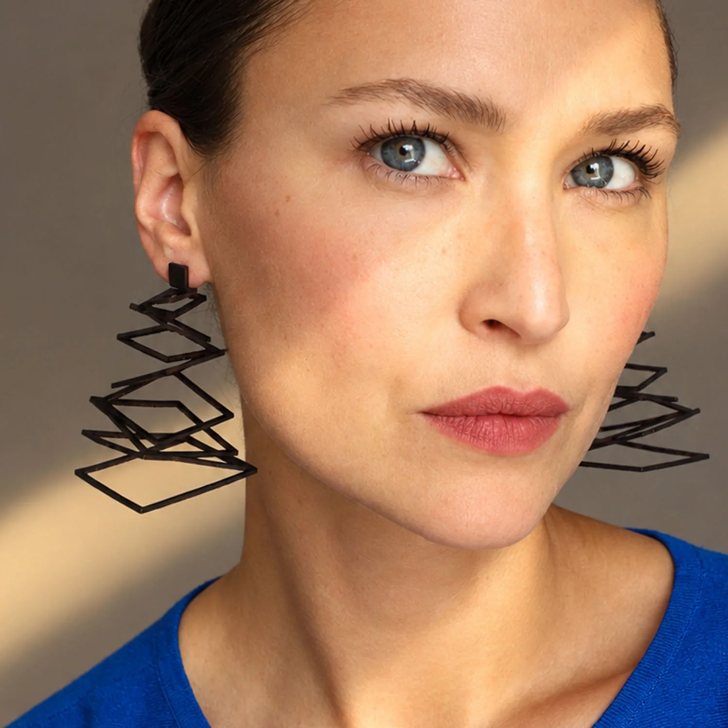Falling-squares-leather-earrings-statement-black-Tania-Clarke-Hall-modelled-detail.jpg
