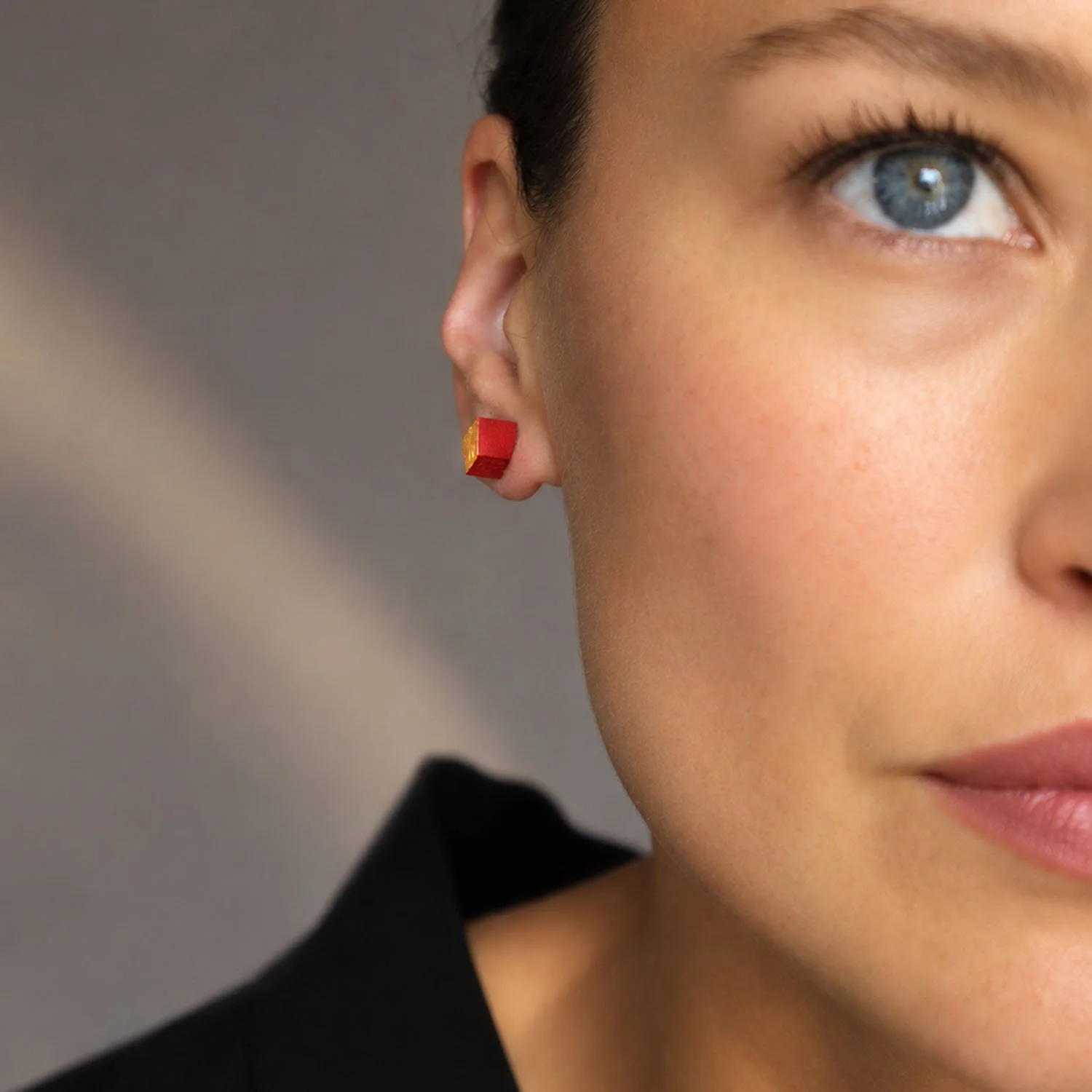 Diamond-leather-stud-earring-red-gold-Tania-Clarke-Hall-modelled2.jpg