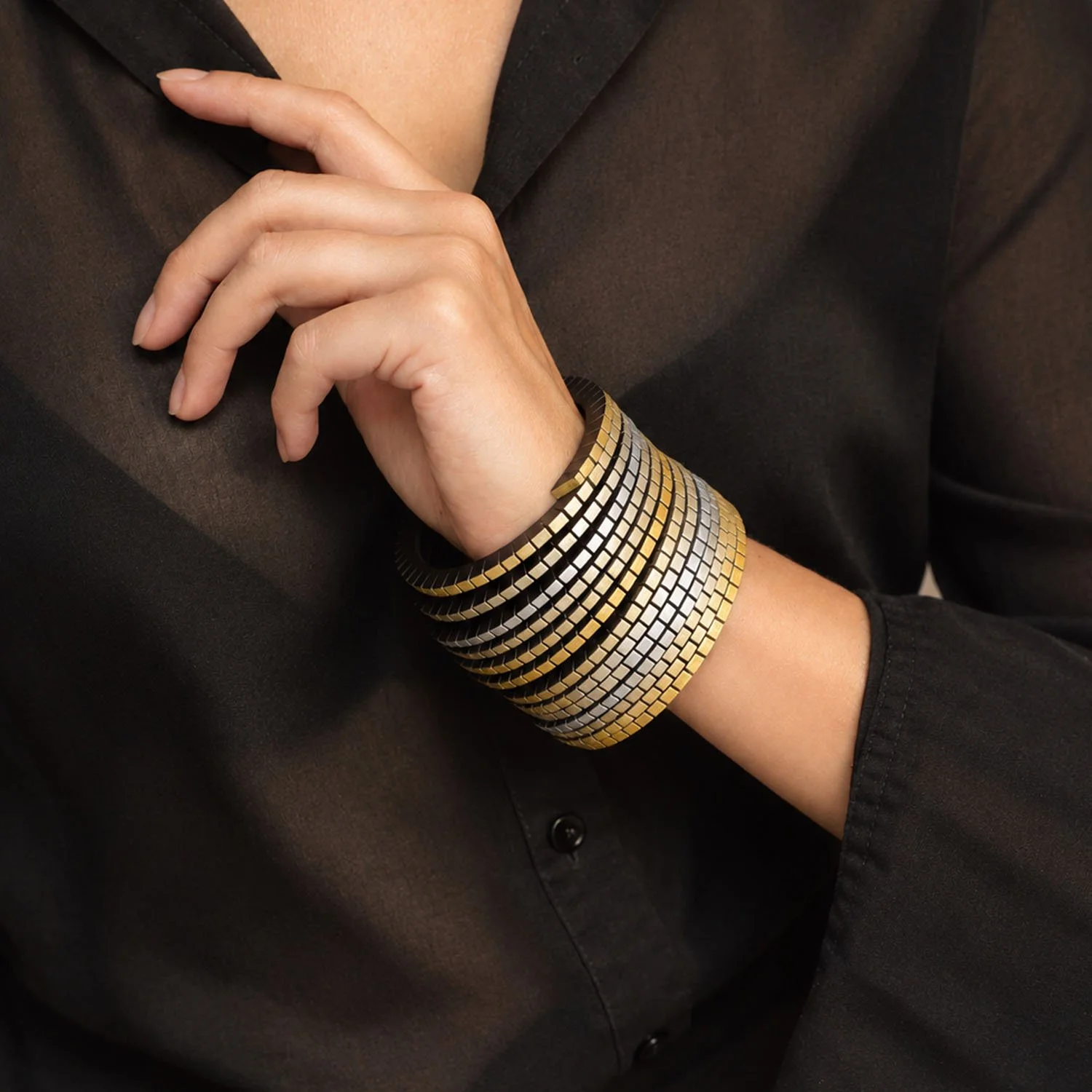 Wound-up-leather-statement-bracelet-gold-silver-Tania-Clarke-Hall-modelled.jpg