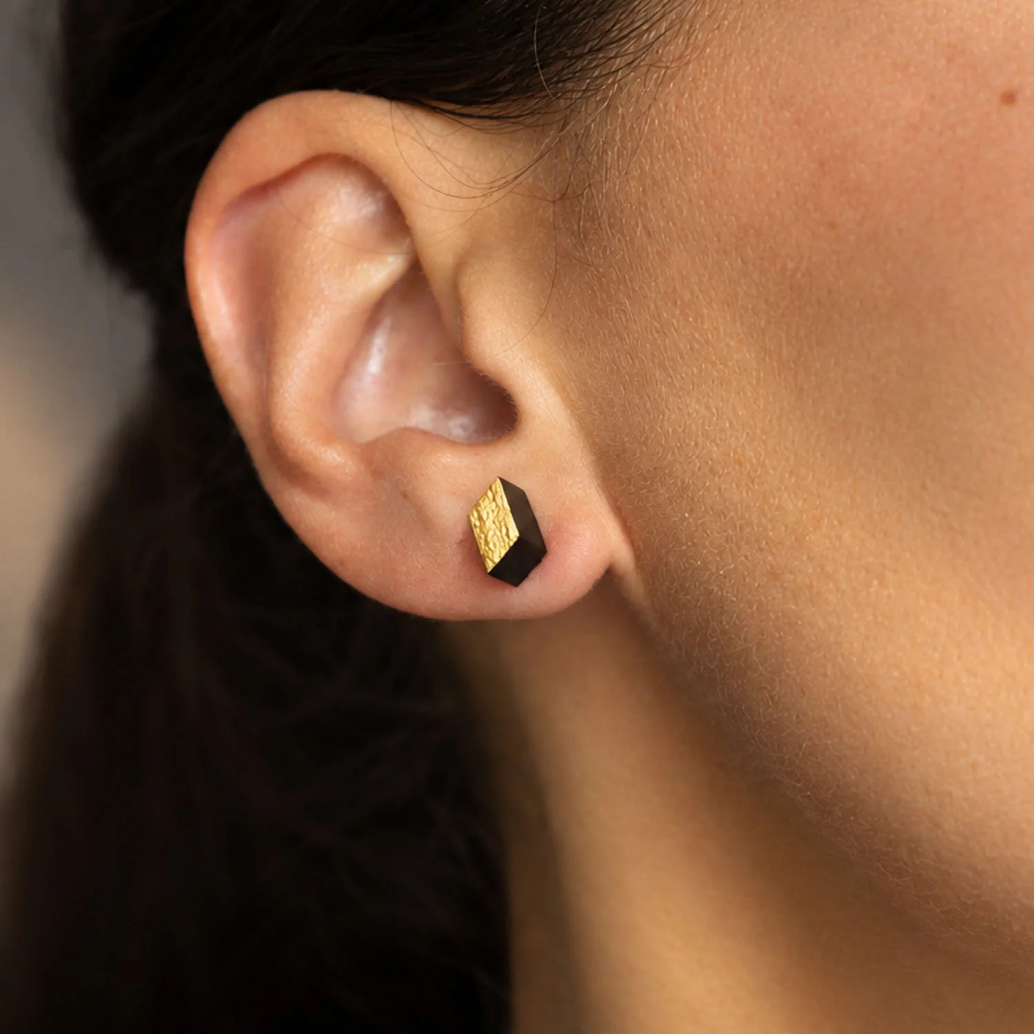 Diamond-leather-stud-earring-black-gold-Tania-Clarke-Hall-modelled-detail3.jpg