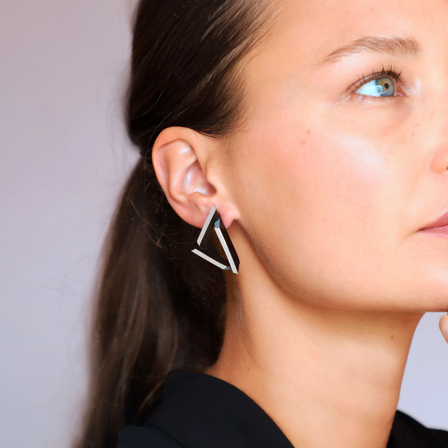 Triangle-leather-earrings-black-silver-Tania-Clarke-Hall-modelled.jpg