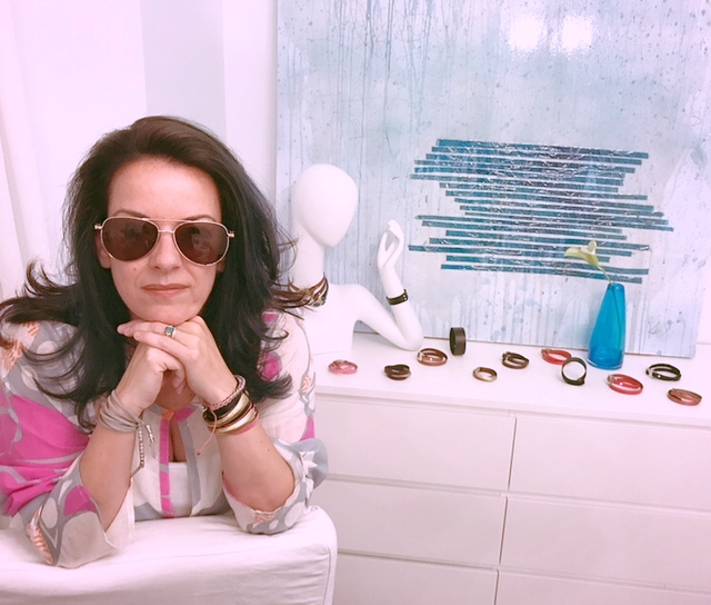 Mersur Muse Erin wearing the Lulu in Hibiscus Sunrise and her signature leather wrist wraps. Get one today! 