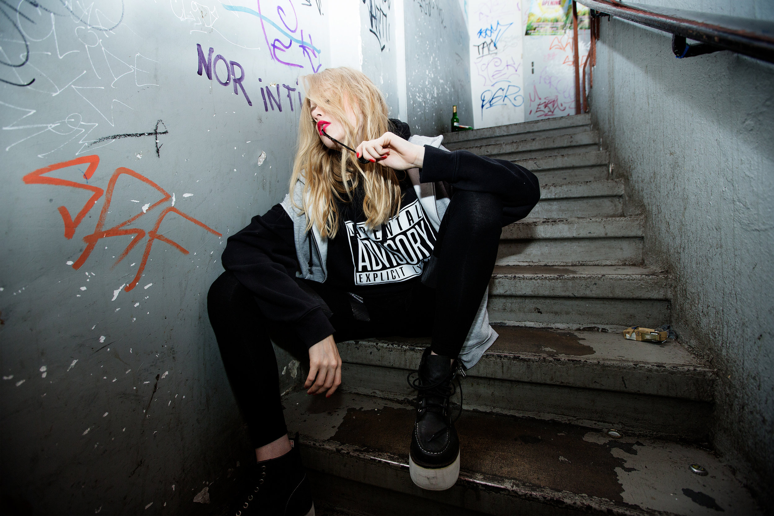 Black hoodie: Russell, Grey hoodie: H&M, Pants: Stylist's own, Shoes: Jeffrey Campbell