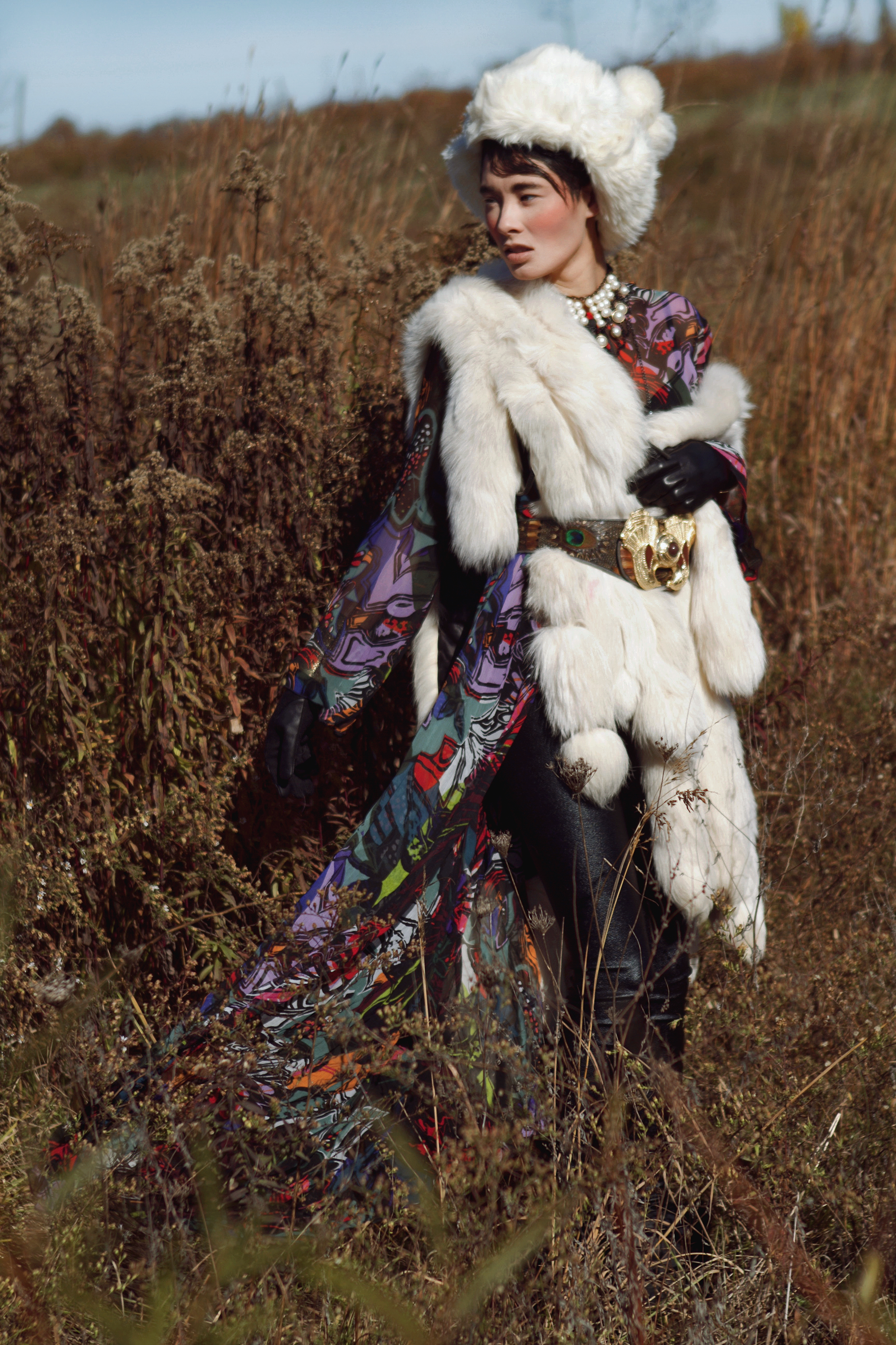 Dress by Carmelita Couture; Fur and leather tights by Teranchula Couture; Fur Hat by Ke Collection