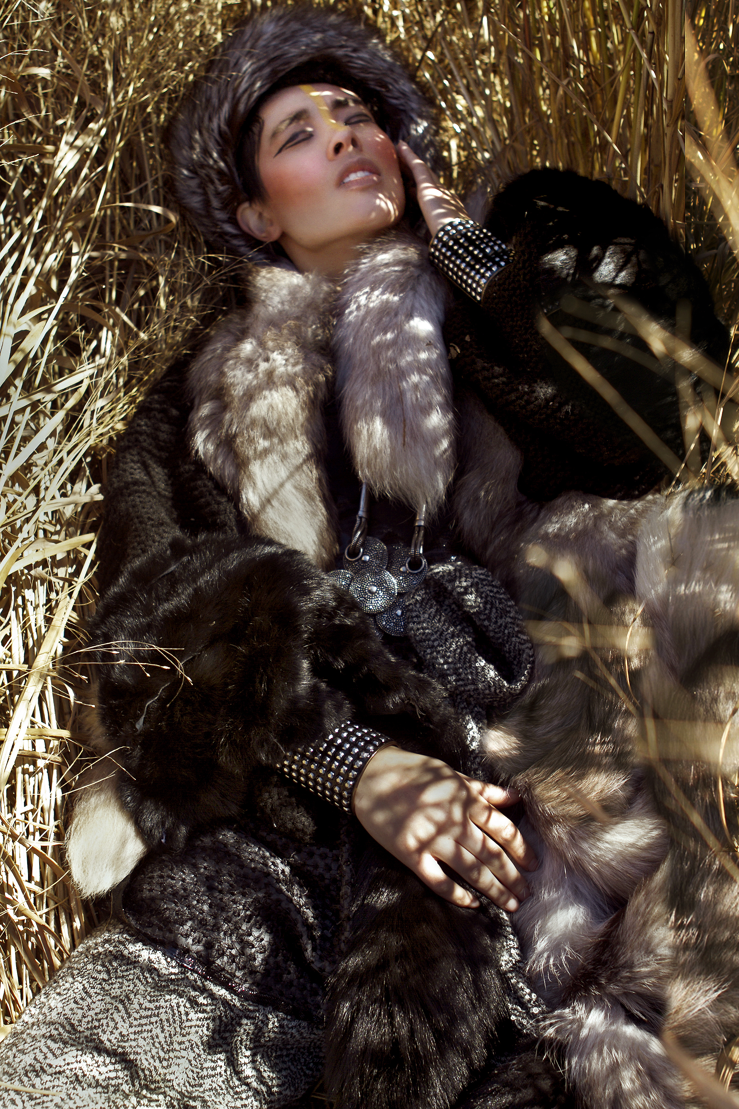Dress by Harx 4; Scarf and fox fur by Teranchula; Tweed belt with fur tips, pants and fur hat by Ke Collection