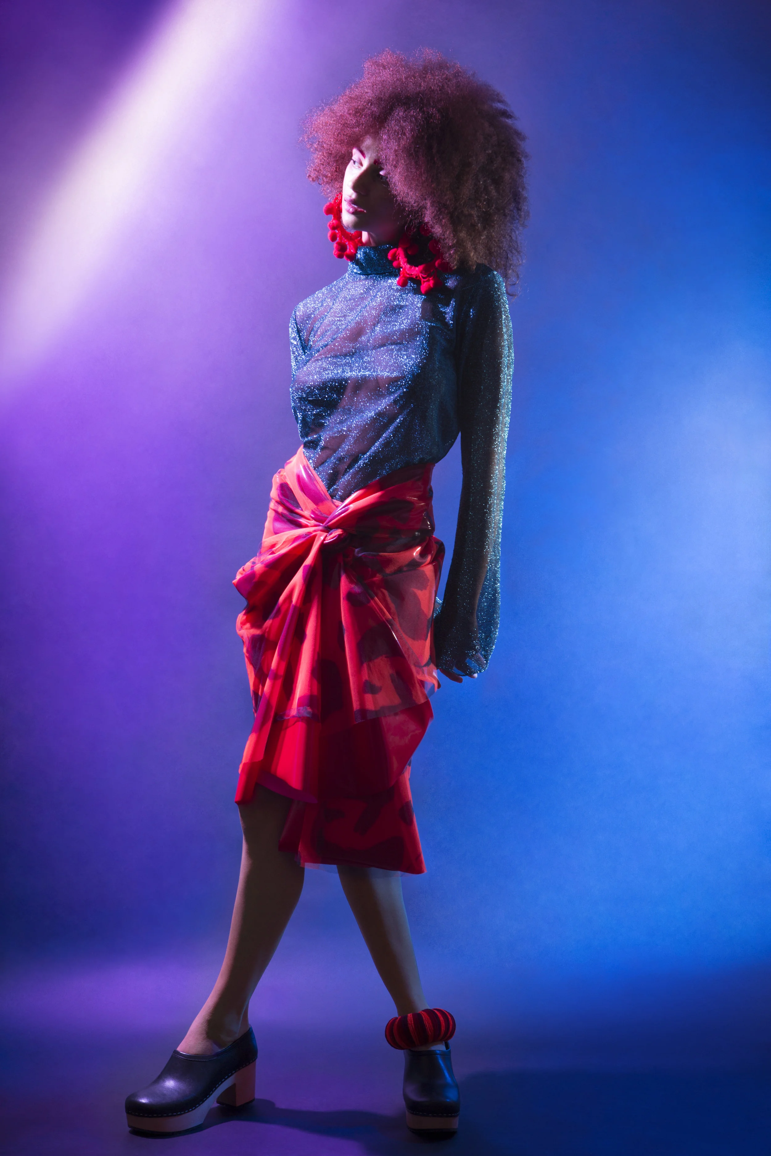 Top: NICOLA BRINDLE, Earrings: ASHLEY ISHAM, Heels: SWEDISH HASBEENS, Hand cuffs: MICHELLE LOWE HOLDER