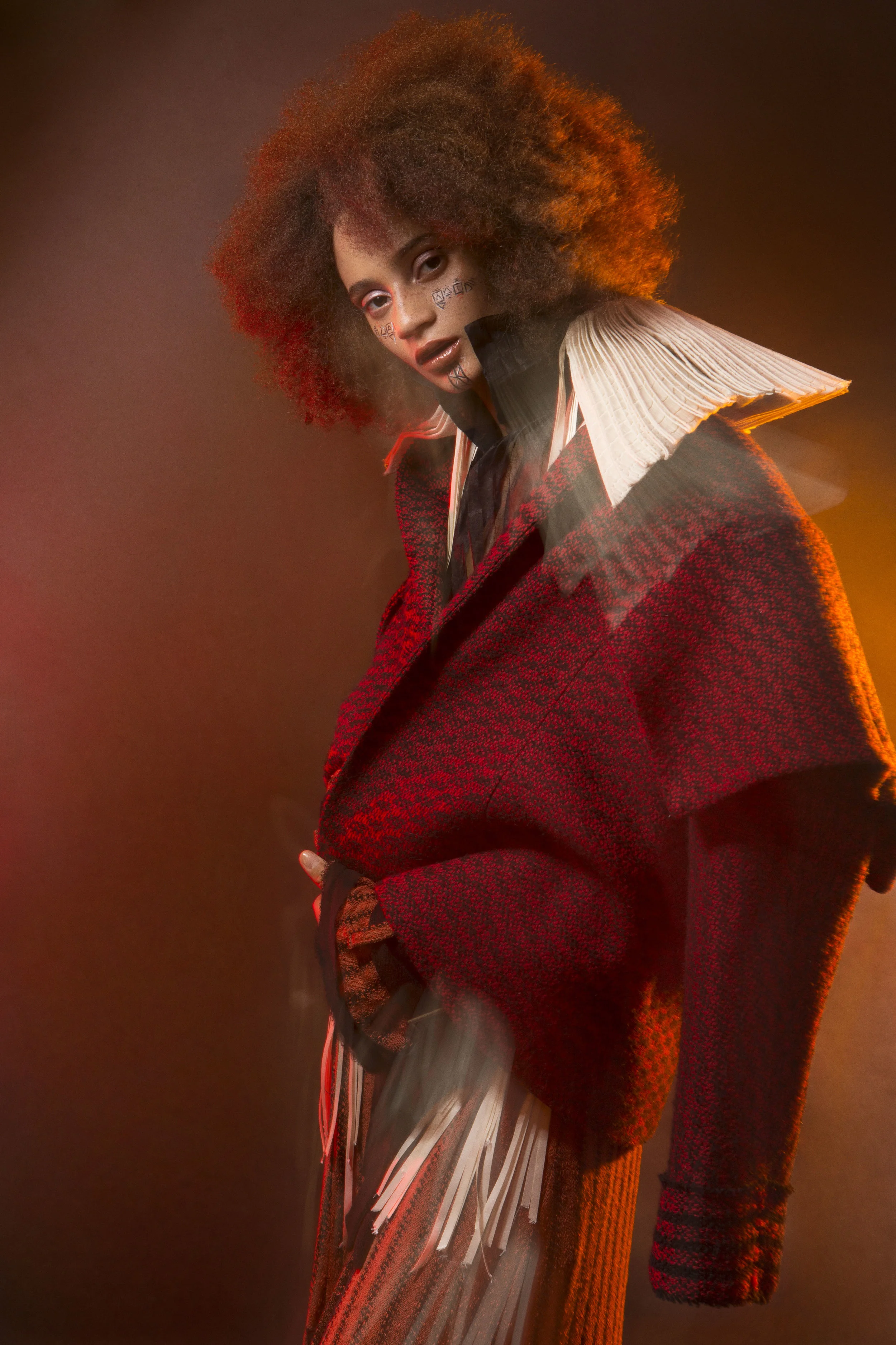 Black Jacket: JAYNE PIERSON, Red Jacket: CIMONE, Long Jacket: MARIANA JUNGMANN, Collar Piece: MICHELLE LOWE HOLDER