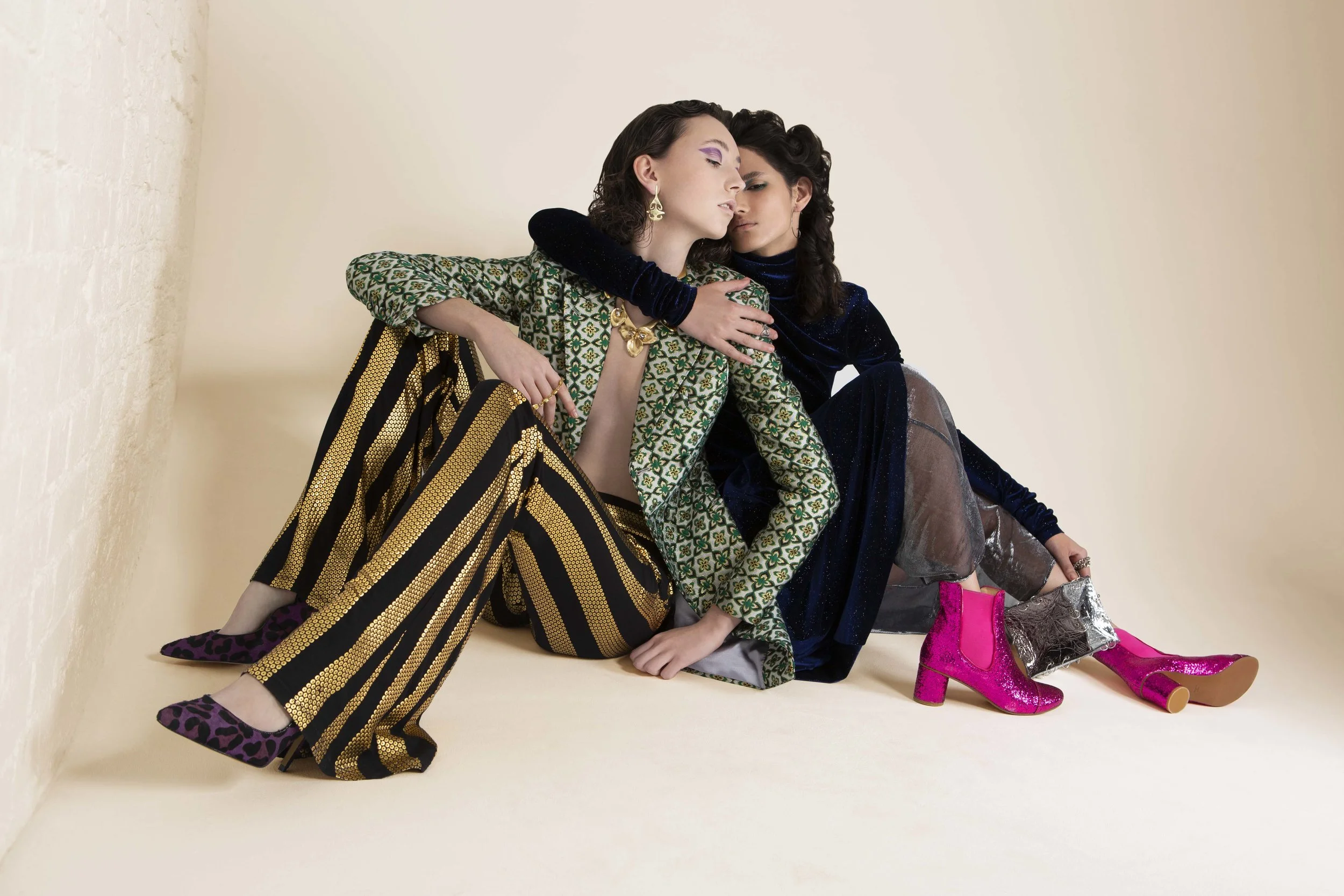 Anotonie (left) Blazer – FANTOME MALAN BRETON Pants – JIRI KALFAR Earring – EKRIA Bracelet – VAN PETERSON Neckpiece – STELLA & DOT Footwear – ROKIT Sara (Right) : Dress – LES ANIMAUX Pants – TRAMP IN DISGUISE Earring – EKRIA Ring - EKRIA Bag – FLORENCE BRIDGE (YOUNG BRITISH DESIGNERS) Footwear – STINE GOYA