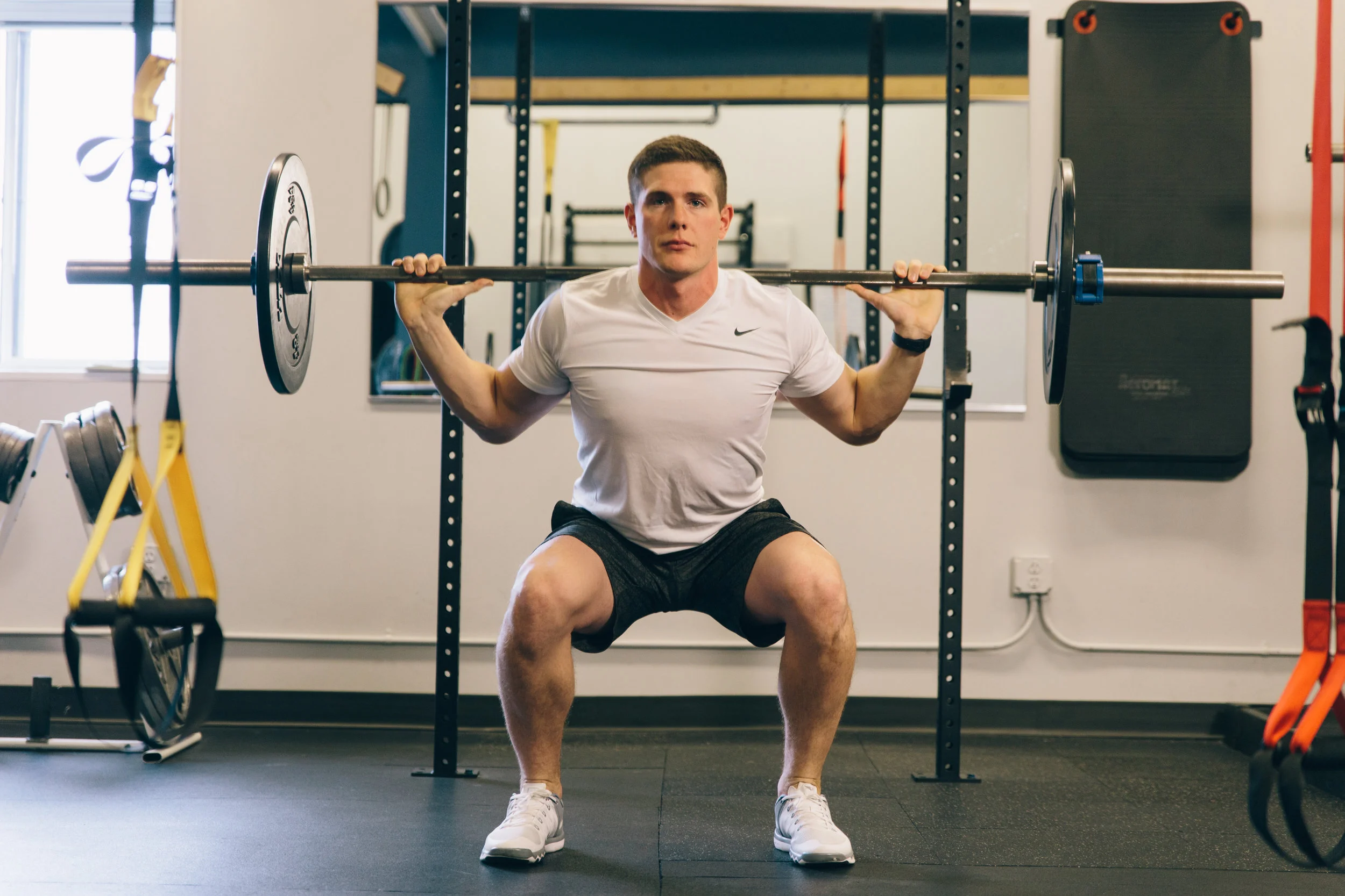 Pulse Podiatry Weight lifting barbell squat form