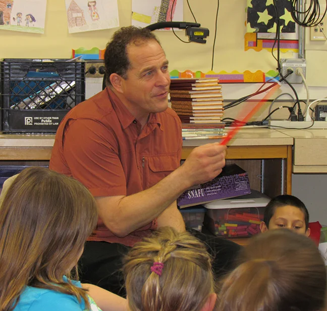 Poetry Bill entertaining Greeley students.