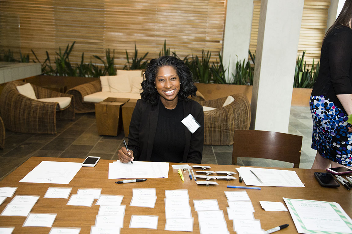Maria Griffon is checking in members at an Emerge America fundraiser with New York Attorney General Tish James and Danica Roem. New York, NY. 2018