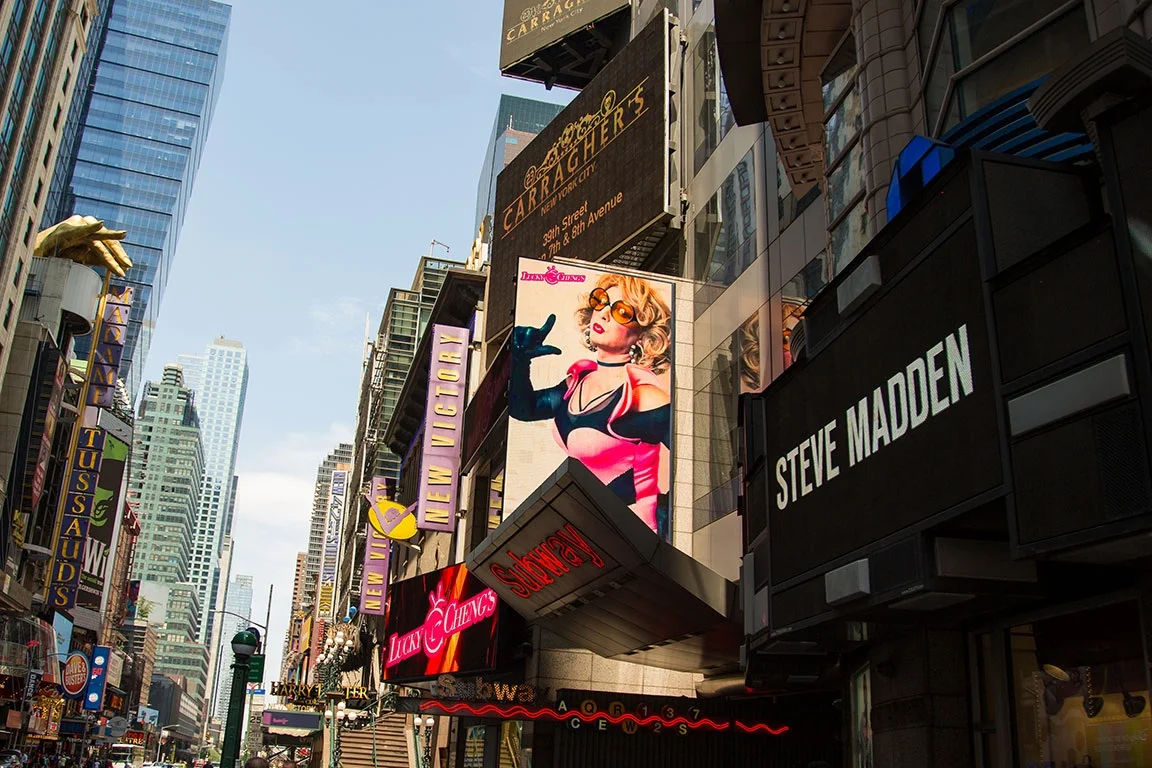 Original Photography by Kristen Blush appears on a billboard in Times Square during PRIDE Weekend for Lucky Cheng’s Drag Cabaret, New York’s longest running drag show.