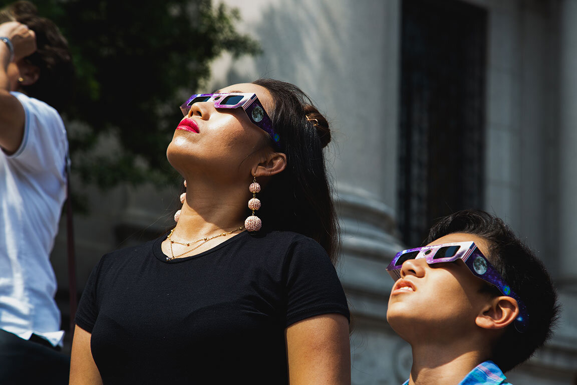  A crowd gather’s at the American Museum of Natural History to view the total solar eclipse. New York, NY 2017 