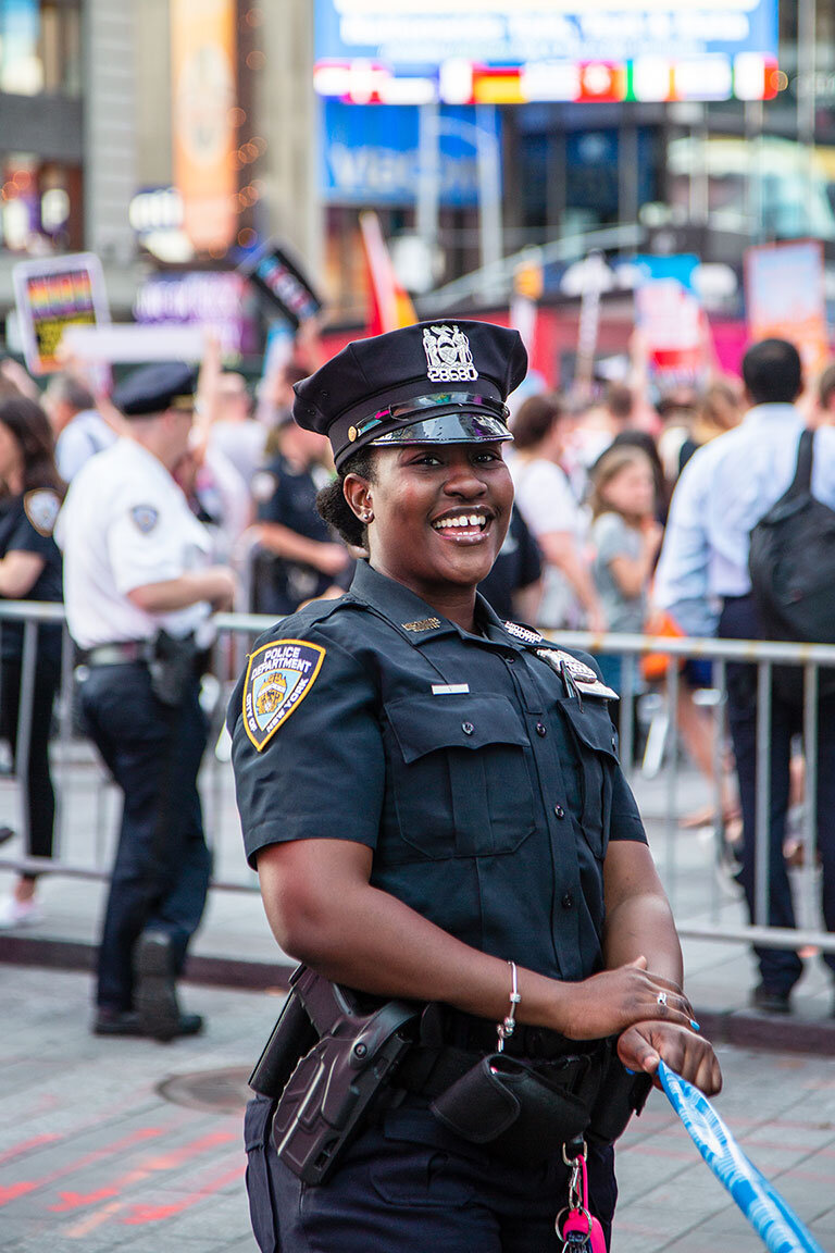  New York City Police Officer is stationed at the ‘Trans are not a Burden’ rally in Times Square. New York, NY 2018 